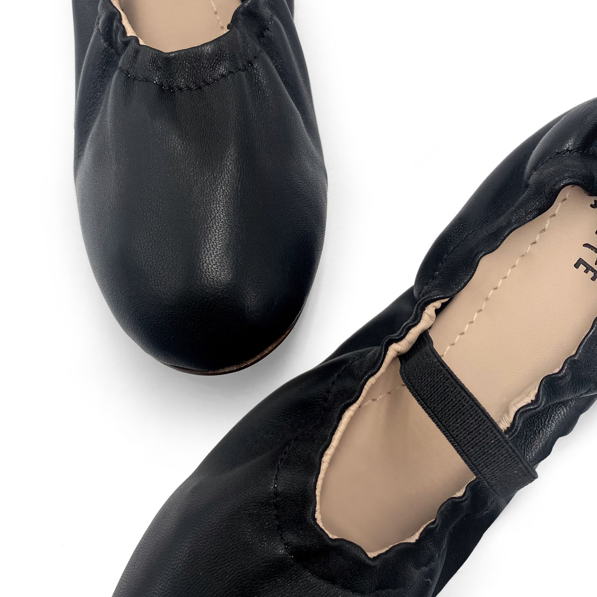 Ballerines montantes en cuir noir à bride élastique