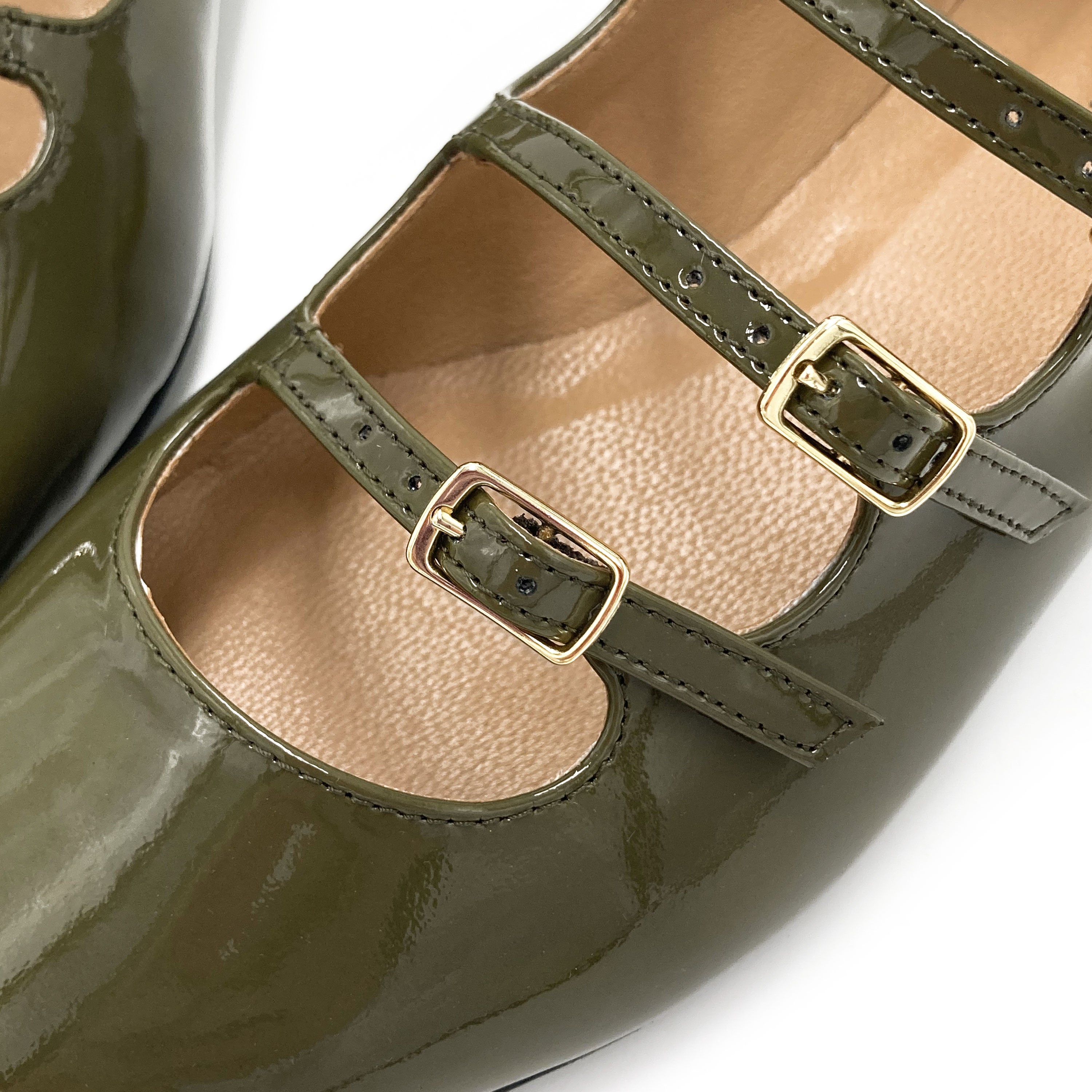 Green shiny pointed ballet flats with three straps