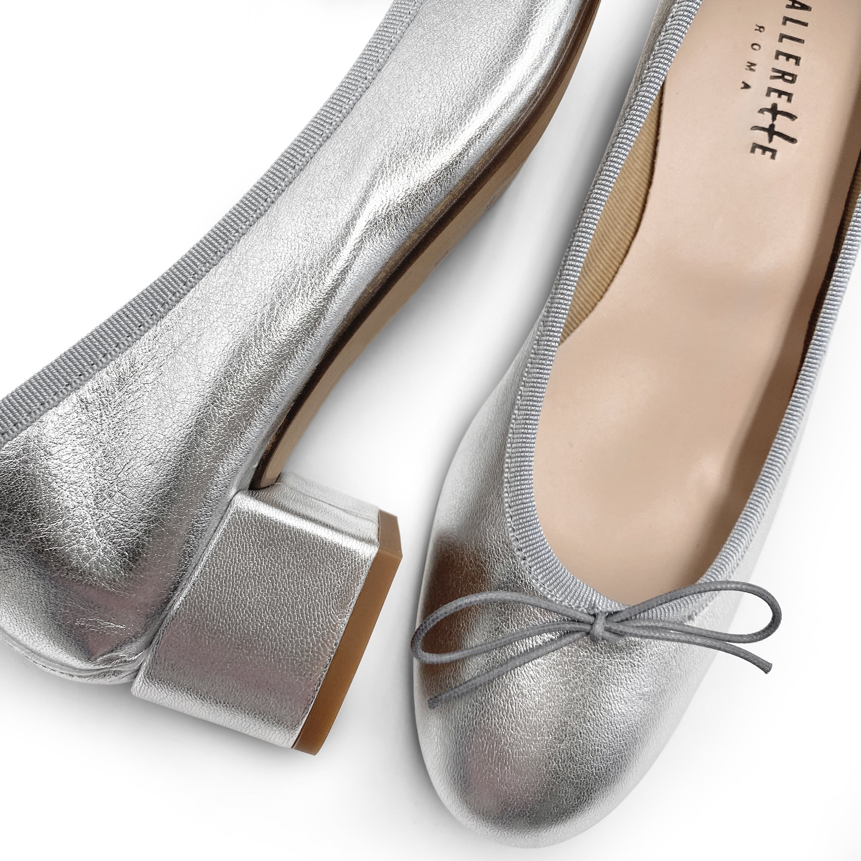 Ballerinas in silver laminated leather with high heel