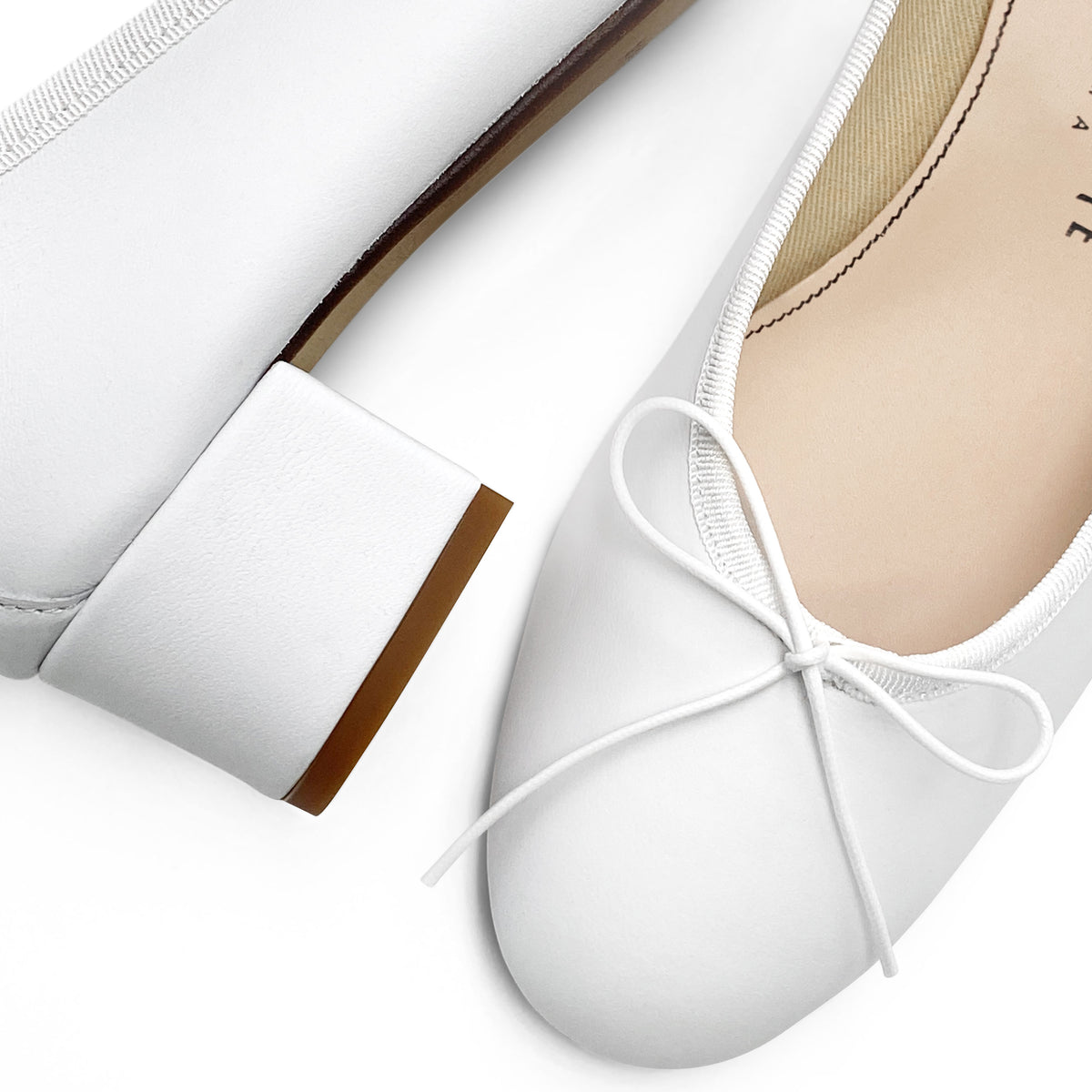 White leather ballet flats with heel