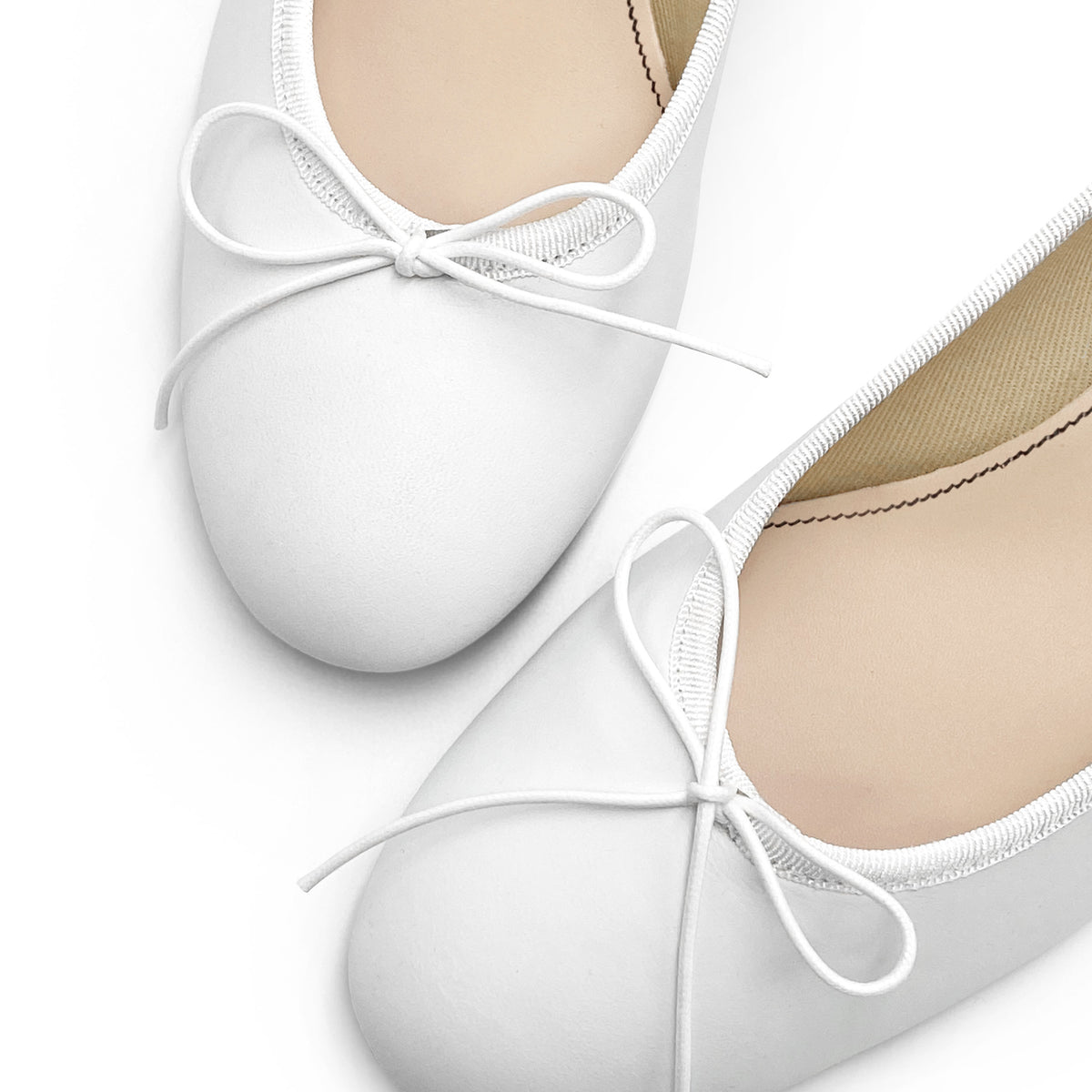 White leather ballet flats with heel