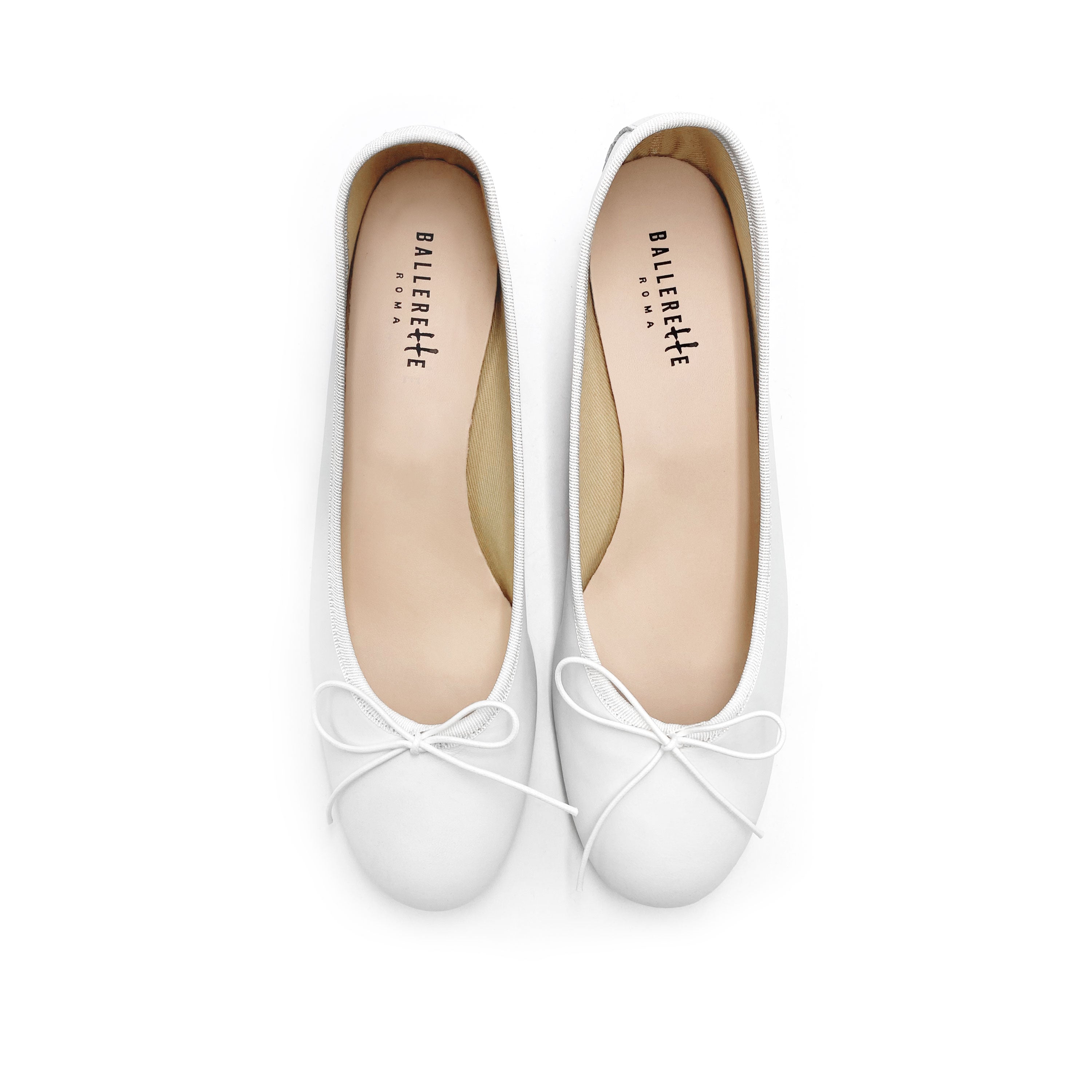 White leather ballet flats with heel