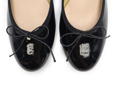 Black patent leather ballet flats with heel