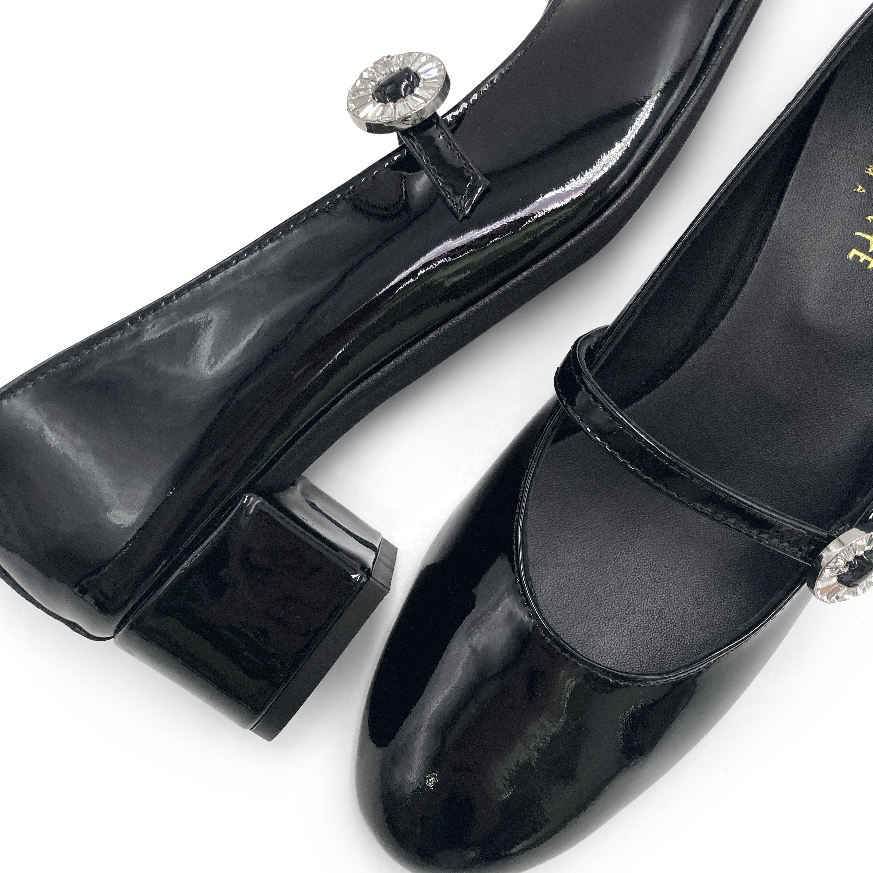 Black patent leather Mary Jane ballet flats with heel and jewelled strap