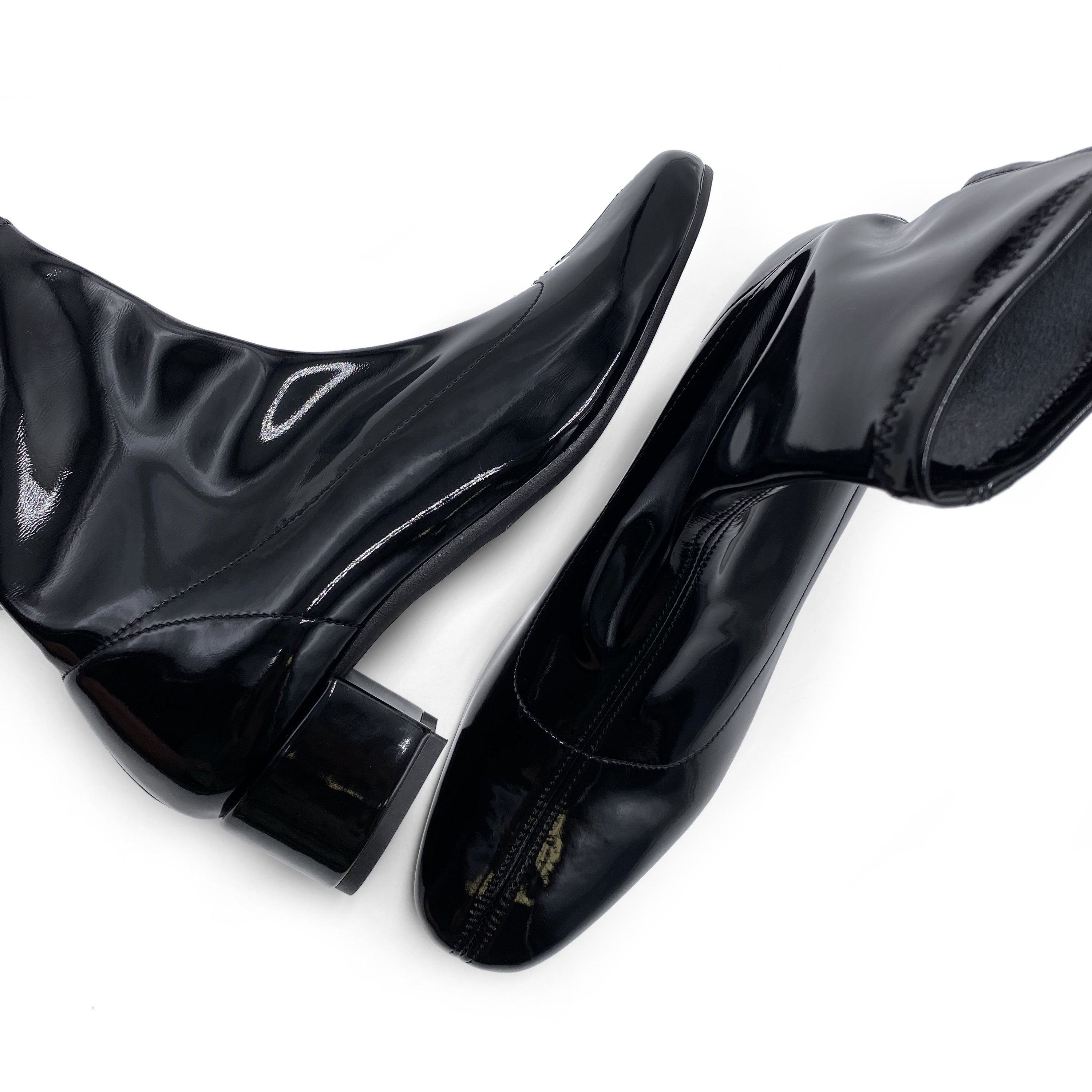 Stivaletti neri in vernice a calza elasticizzata