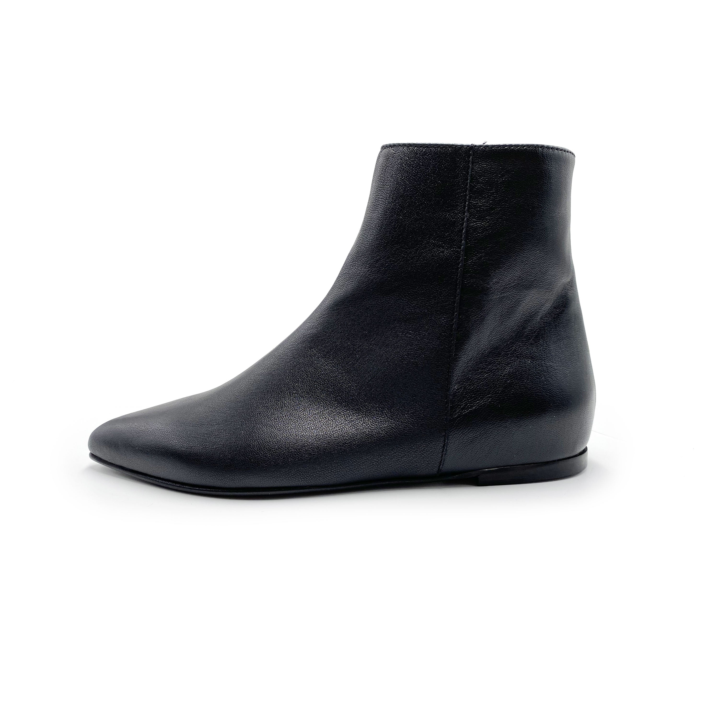 Black leather boots with hidden wedge heel