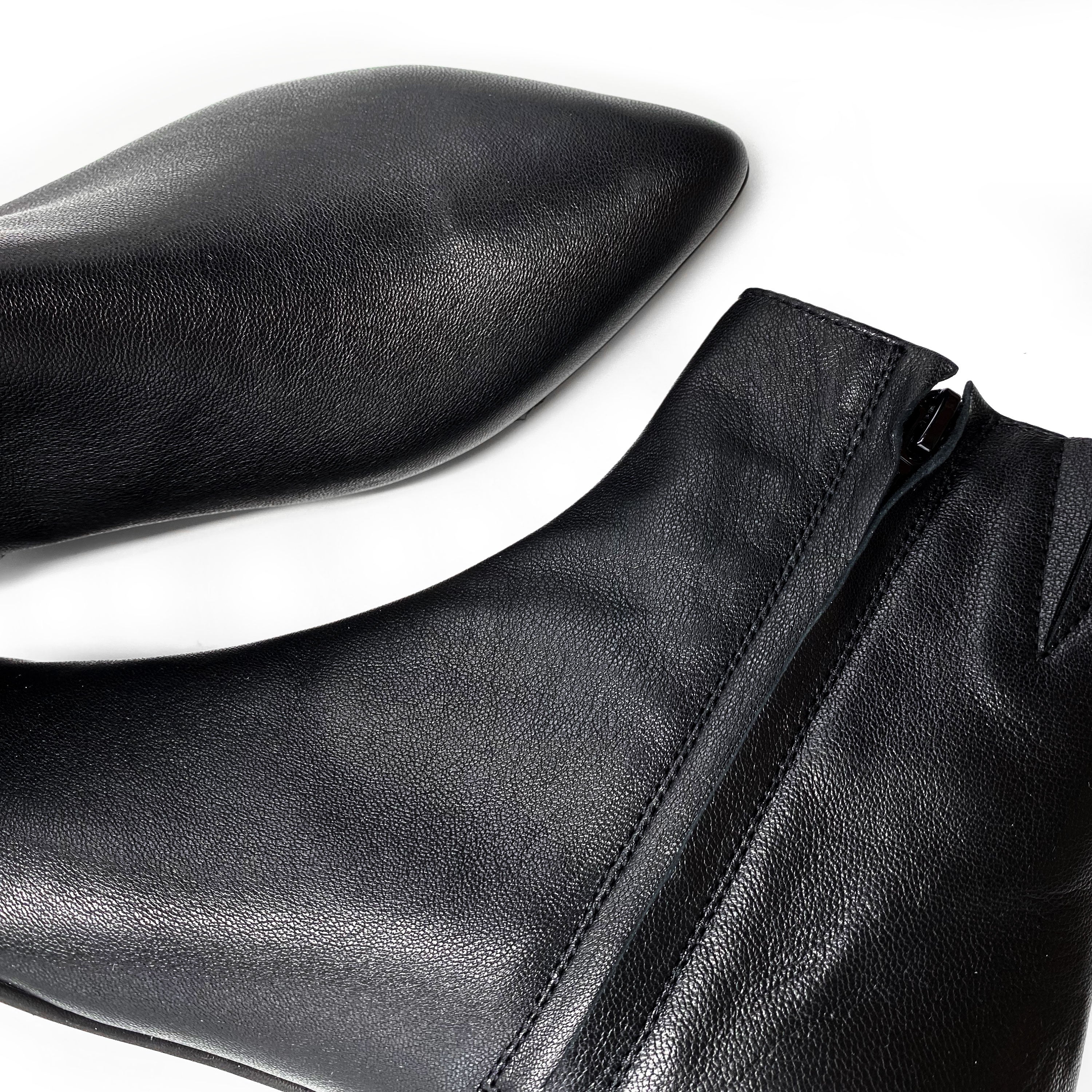 Black leather boots with hidden wedge heel