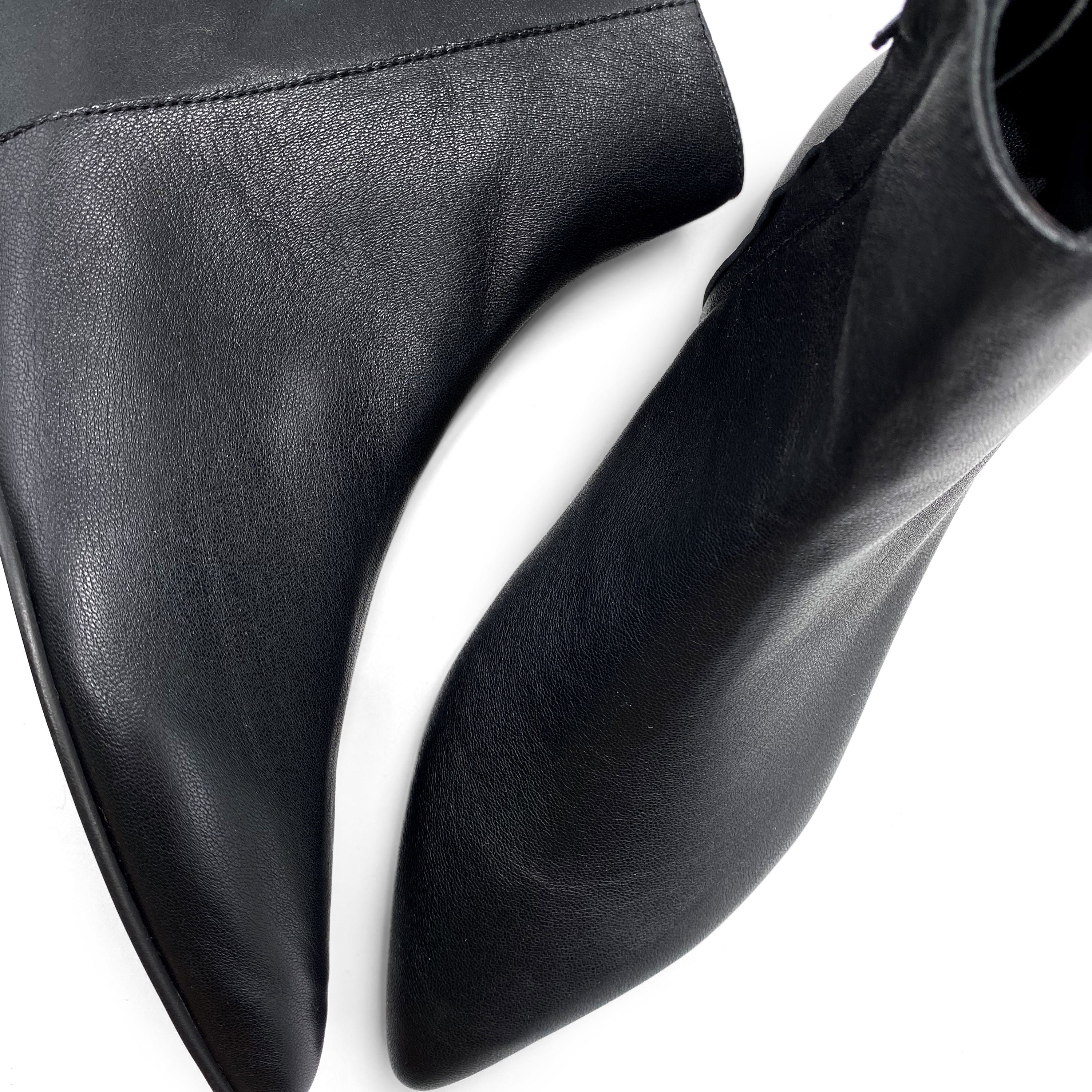 Black leather boots with hidden wedge heel