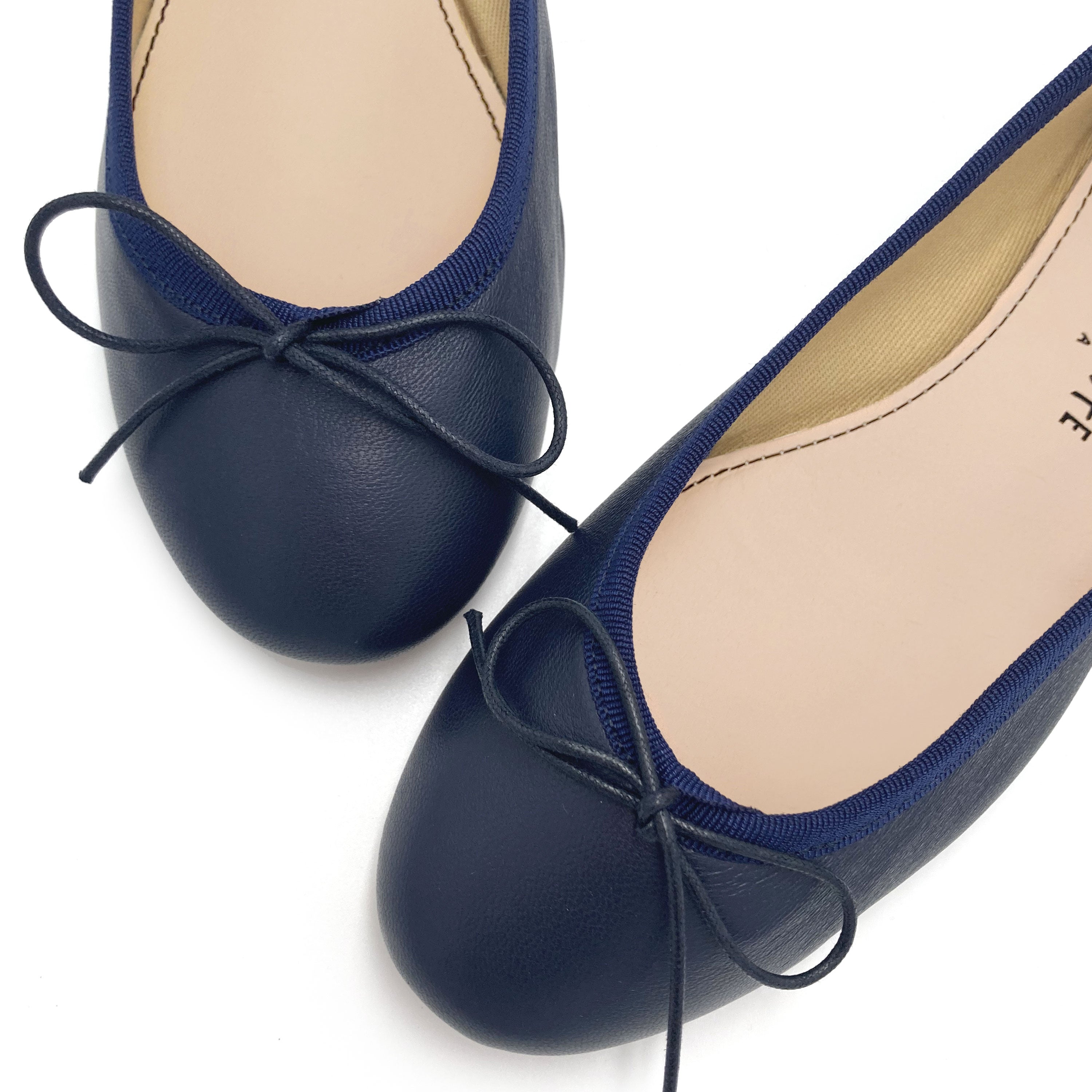 Navy blue leather ballet flats