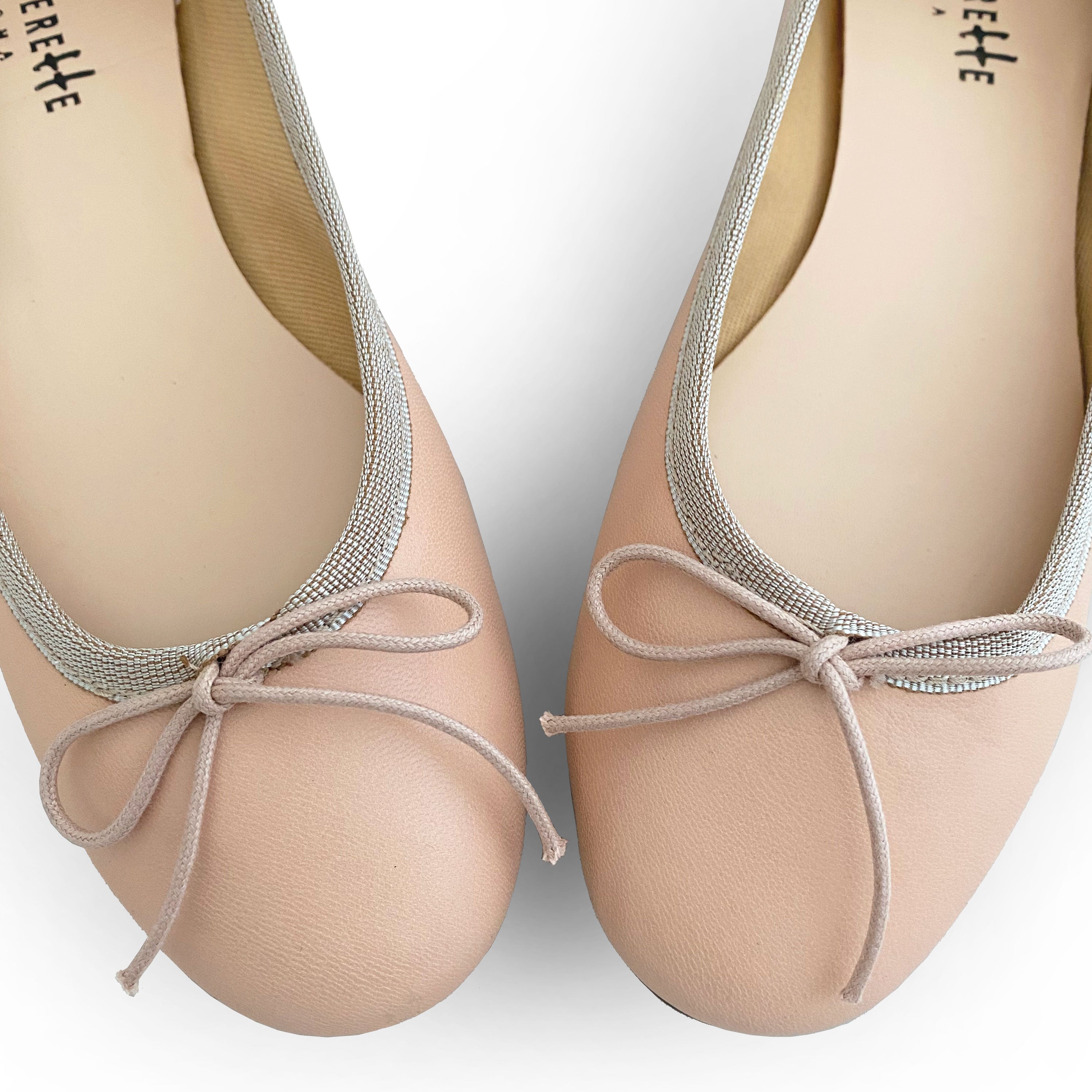 Rosafarbene Ballerinas aus Leder