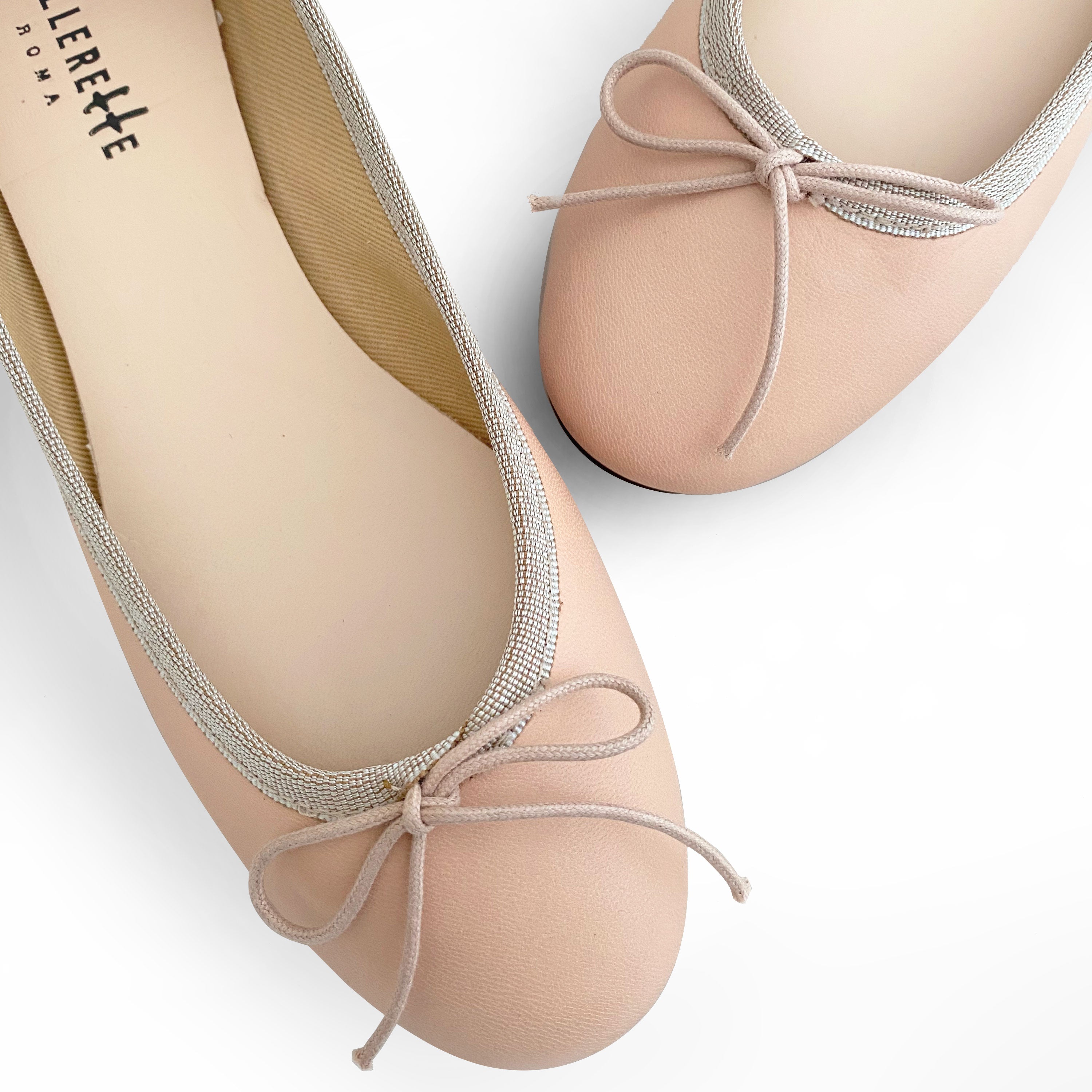 Rosafarbene Ballerinas aus Leder