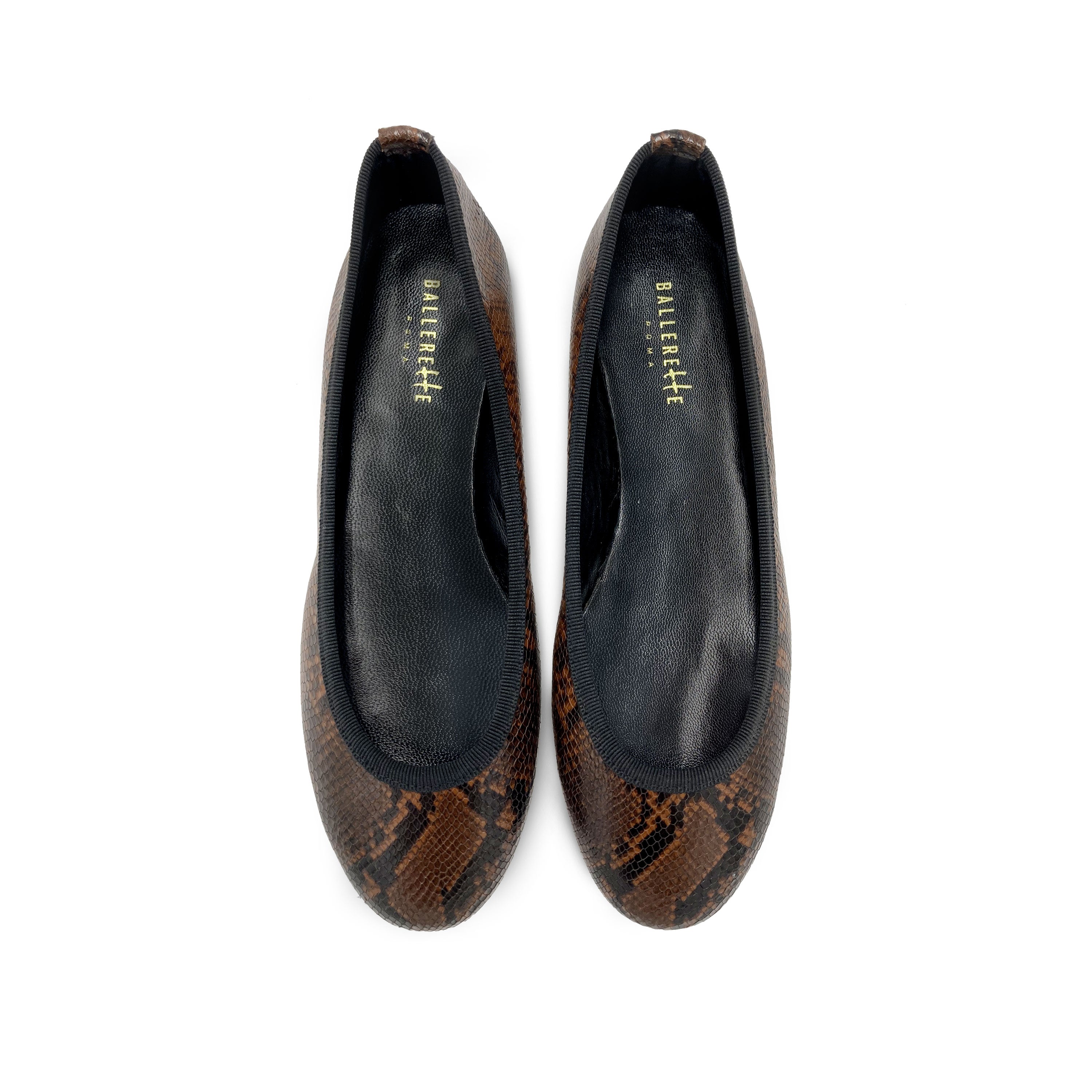 Round toe brown animal print leather flats