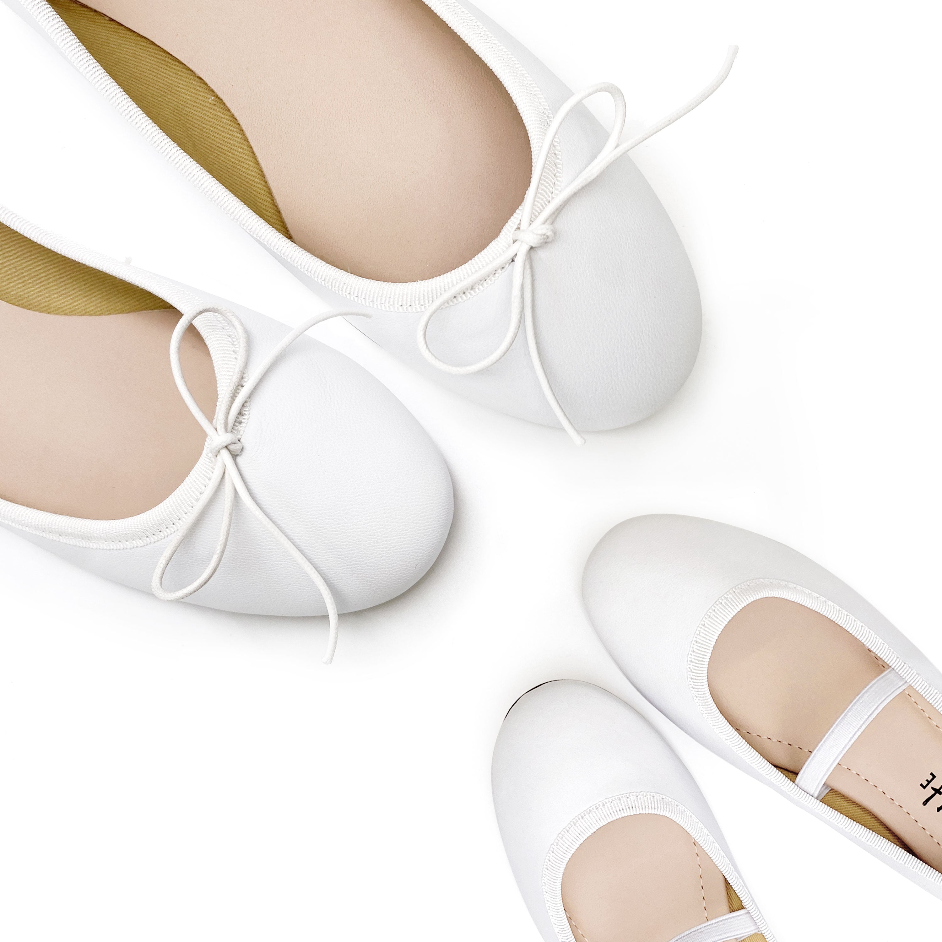 White leather girls ballet flats with elastic band
