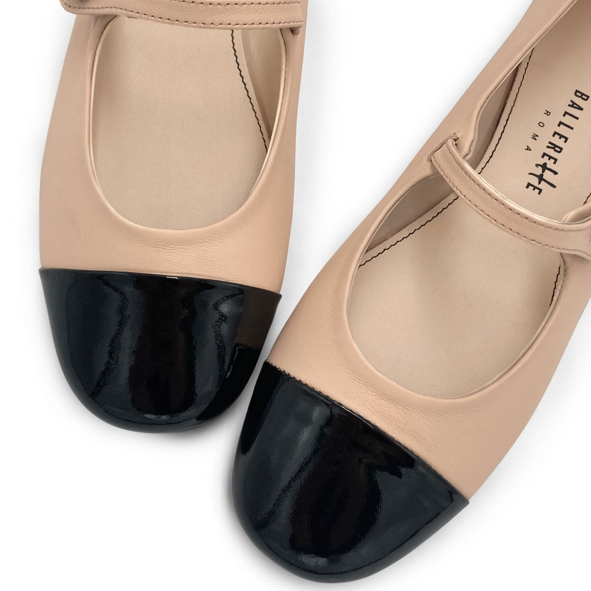 Powder pink leather ballet flats with patent leather strap and toe