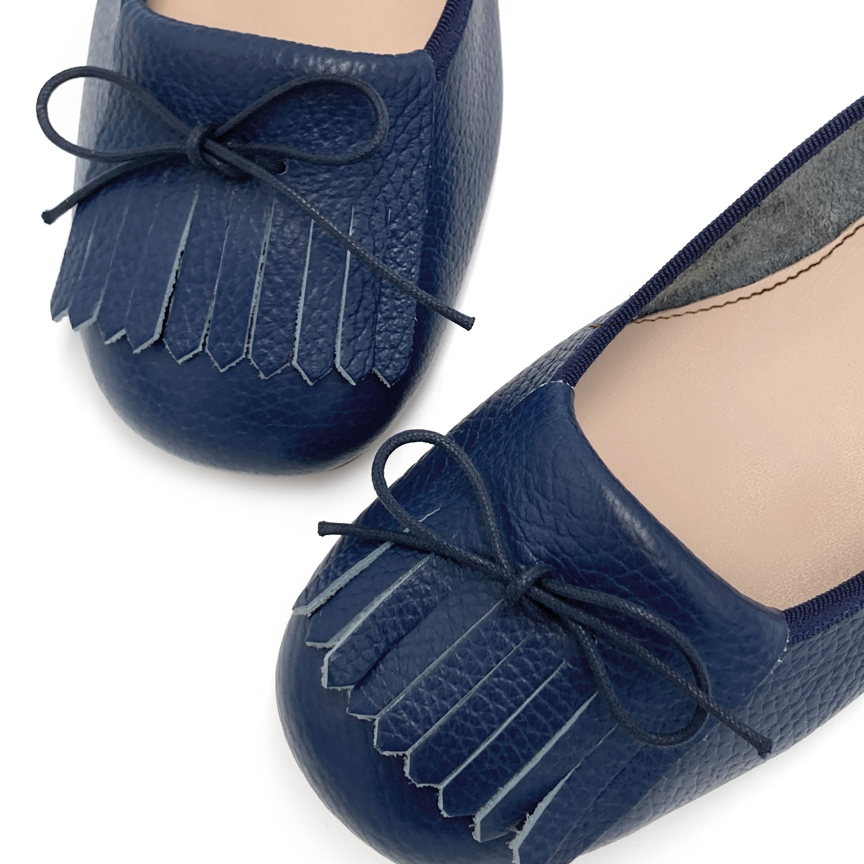 Blue leather moccasins with fringe tassel