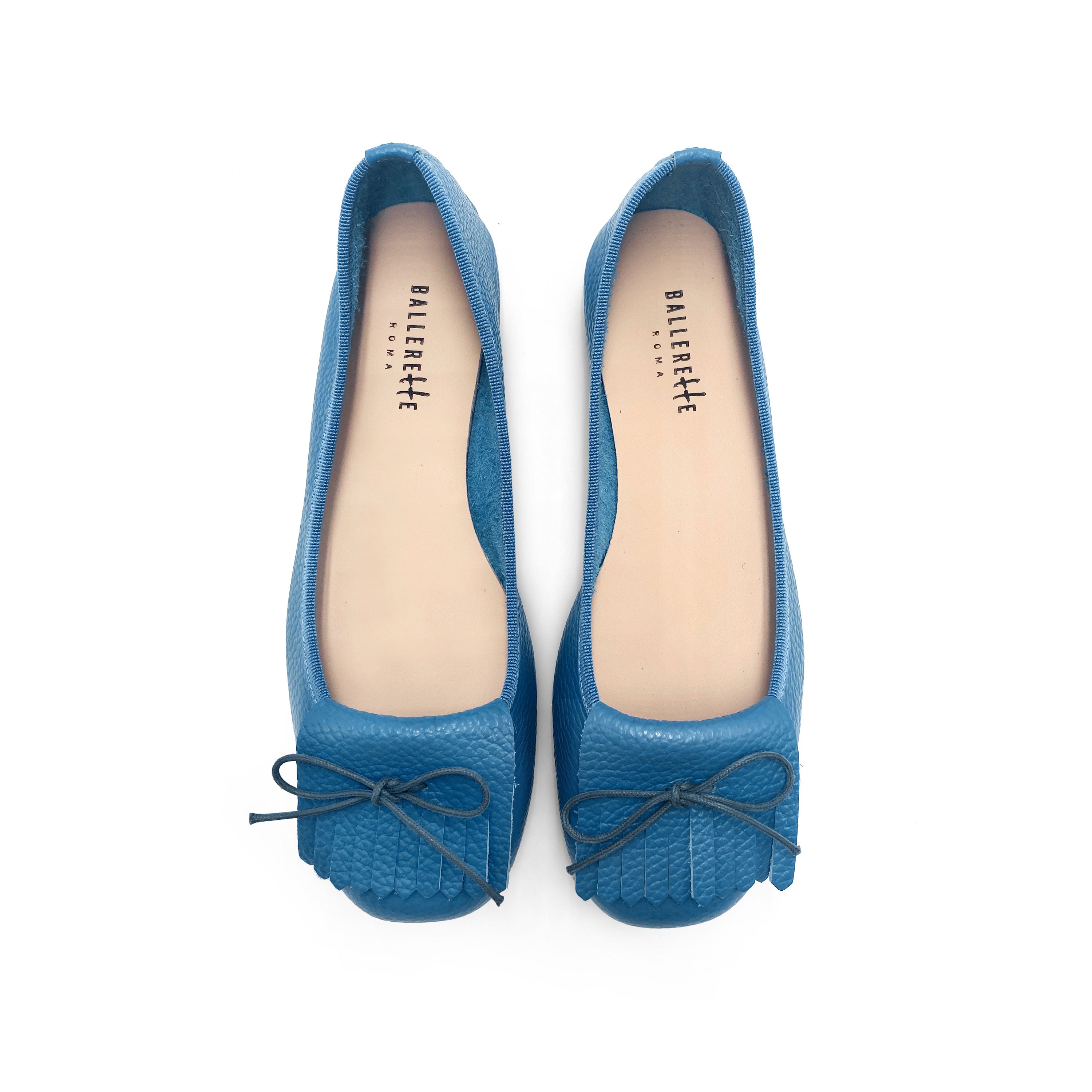 Mocasines de mujer azul cielo de piel con flecos