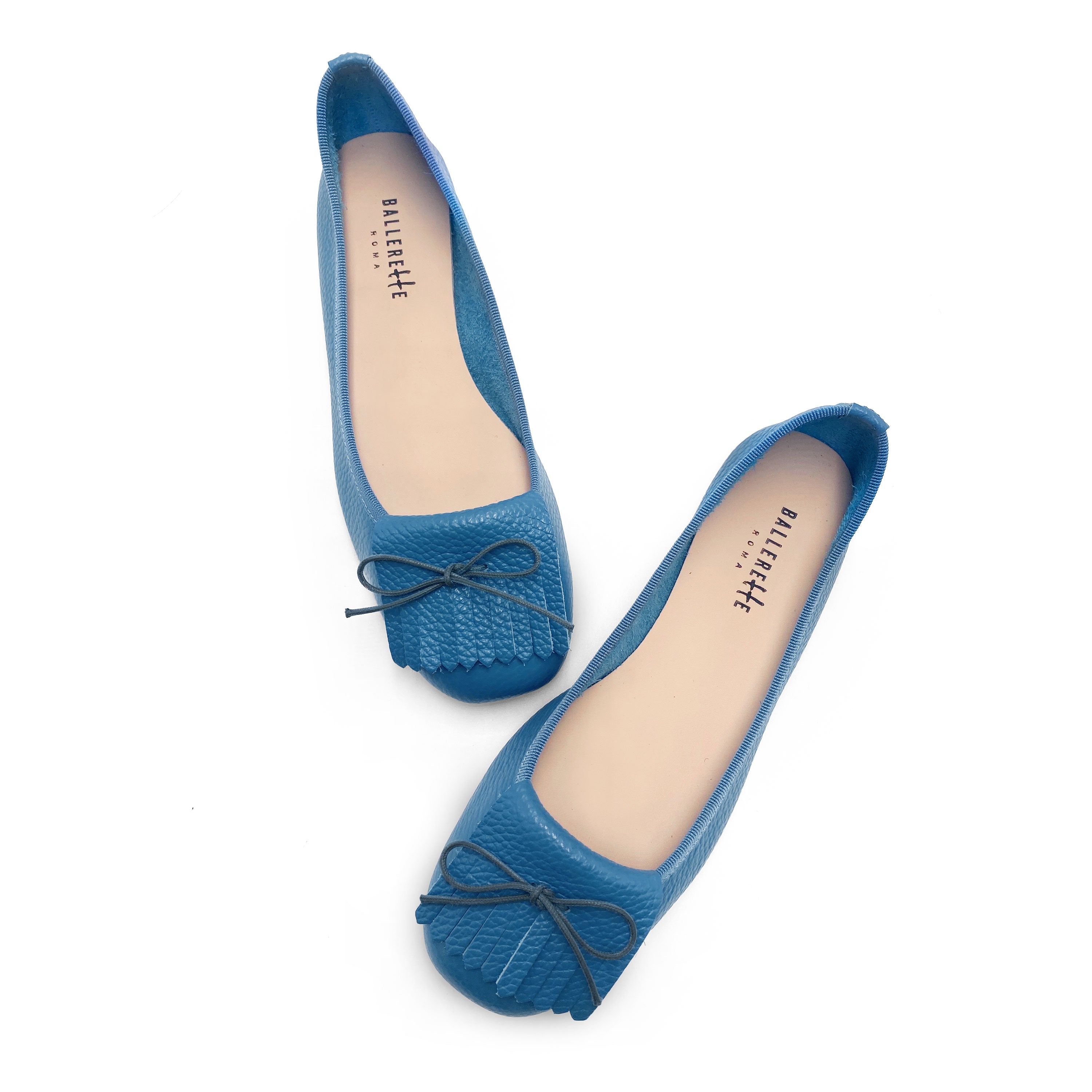 Mocasines de mujer azul cielo de piel con flecos