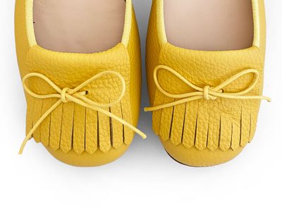 Yellow leather loafers with fringe tassel