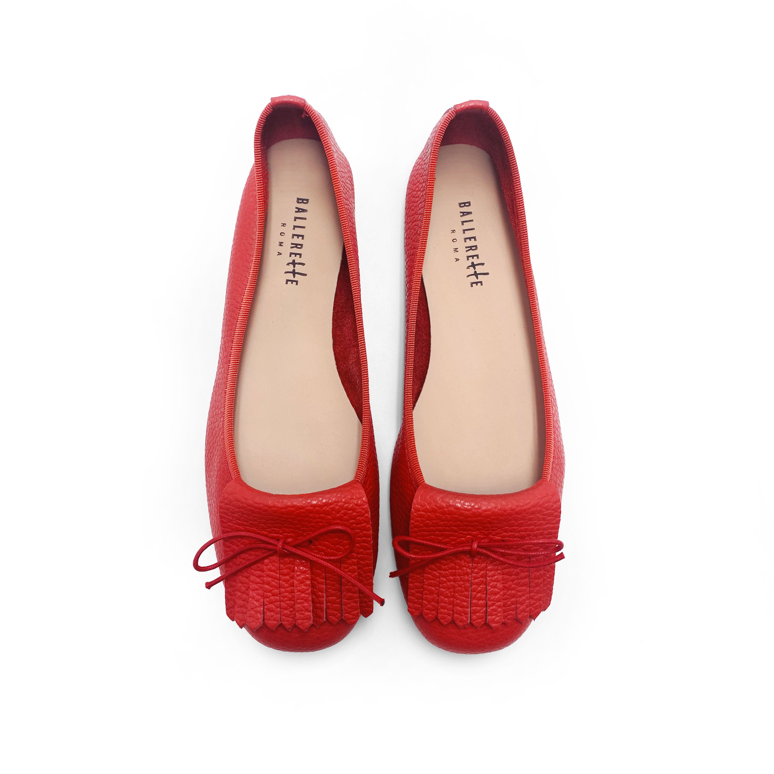 Mocassins femme rouges en cuir à franges