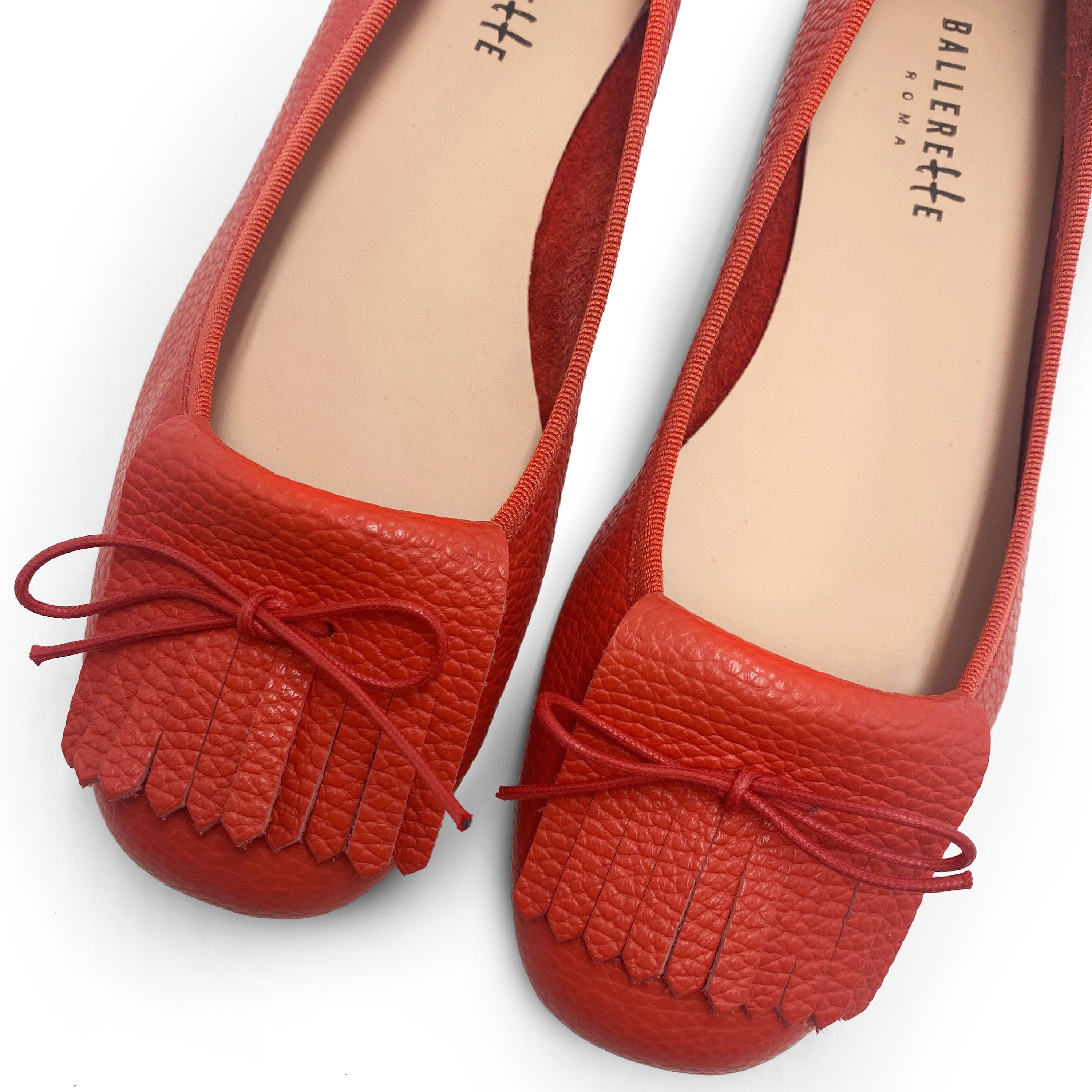 Mocassins femme en cuir rouge à franges