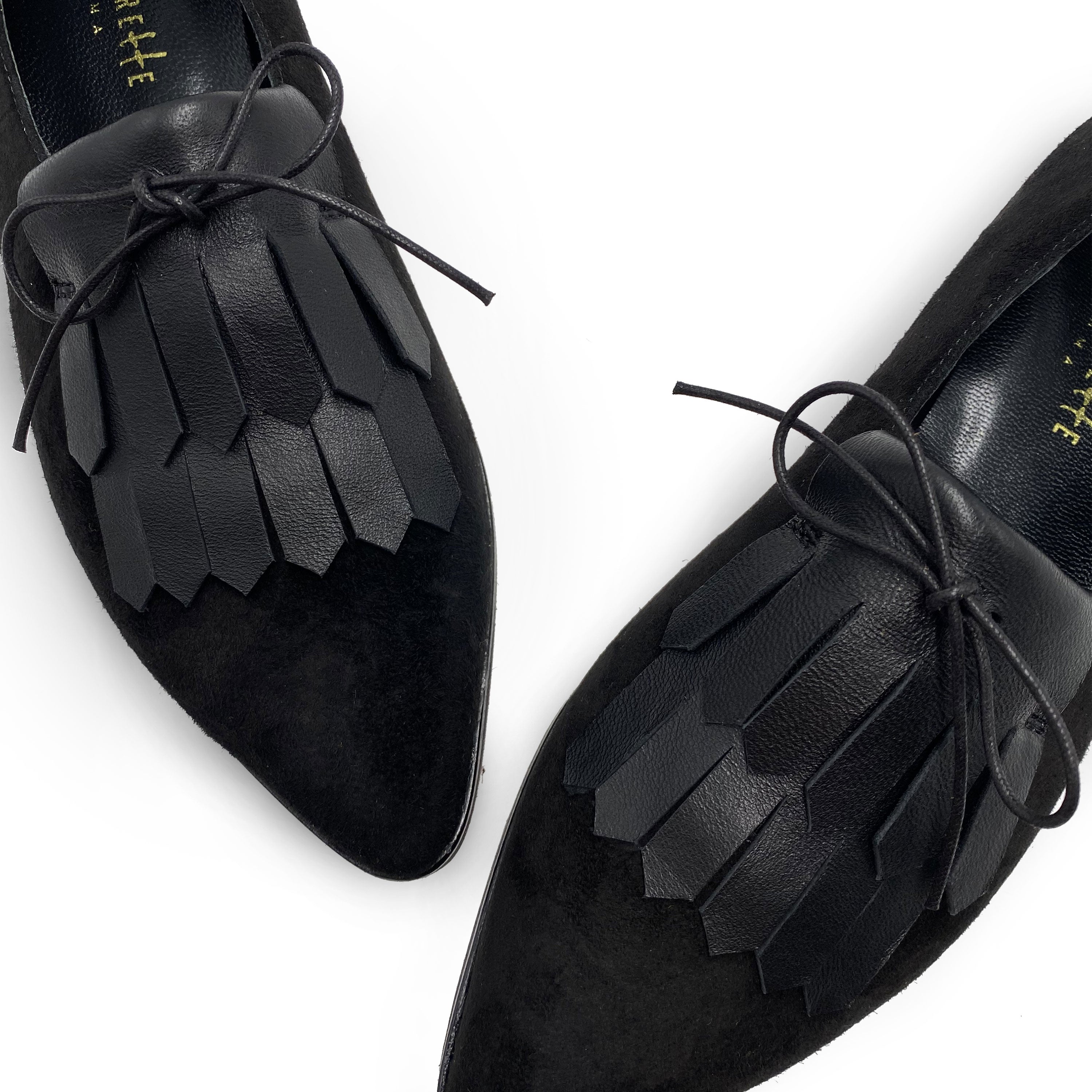 Women’s black suede oxford with leather fringe