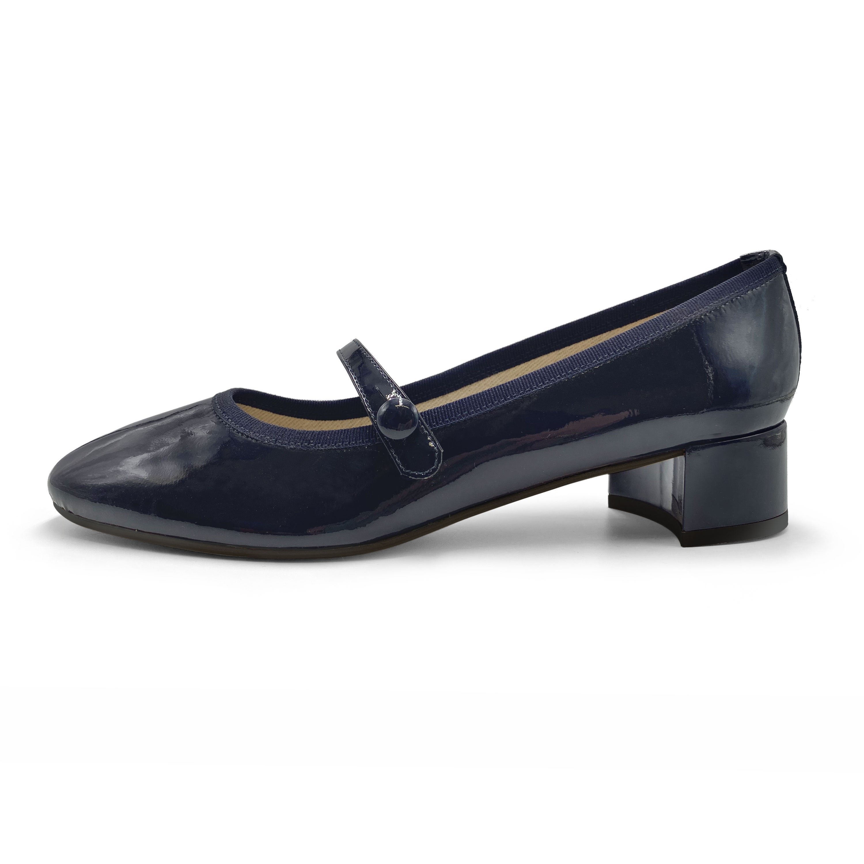 Blue patent leather ballet flats with strap and heel
