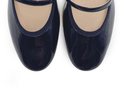 Blue patent leather ballet flats with strap and heel