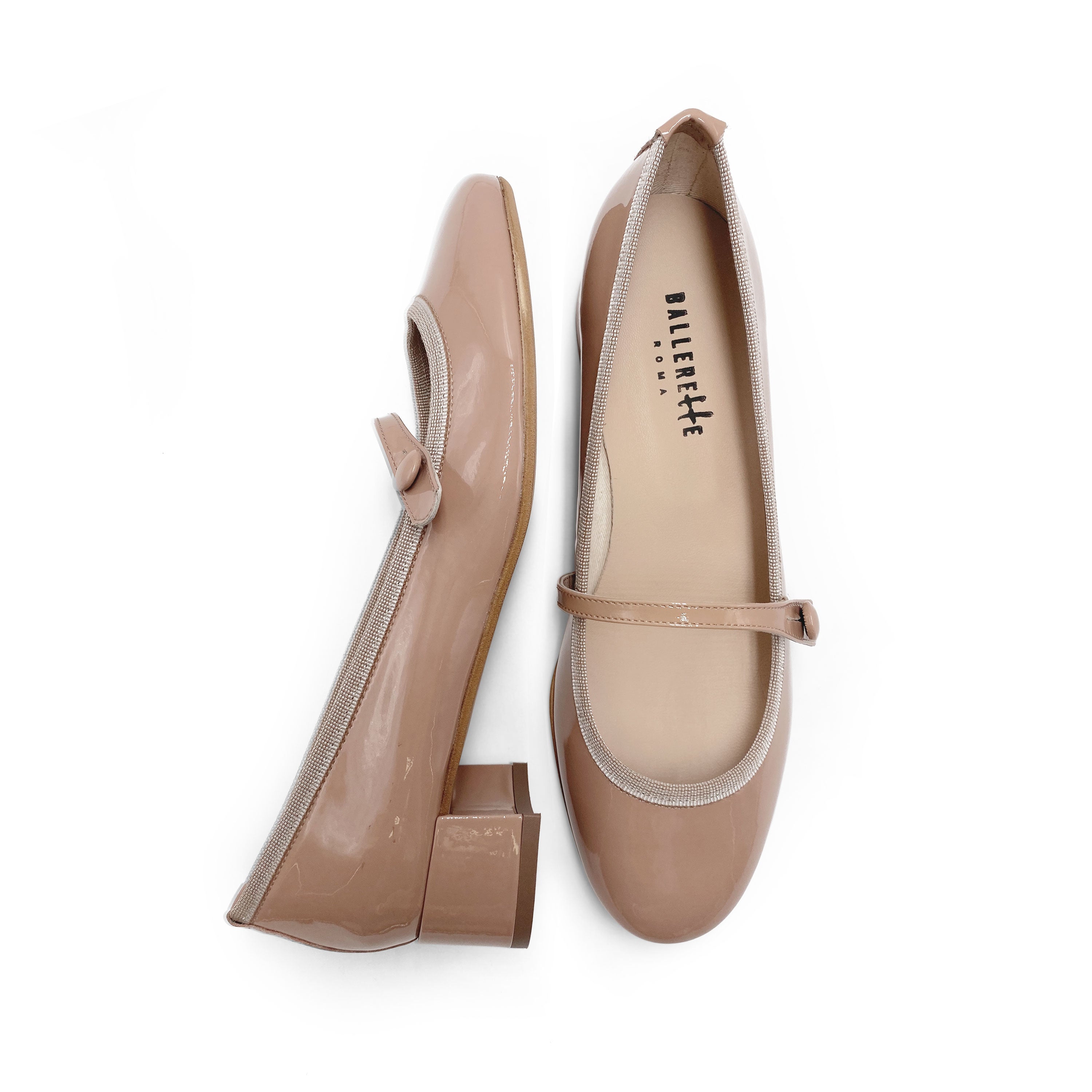 Powder pink patent leather ballet flats with strap and heel