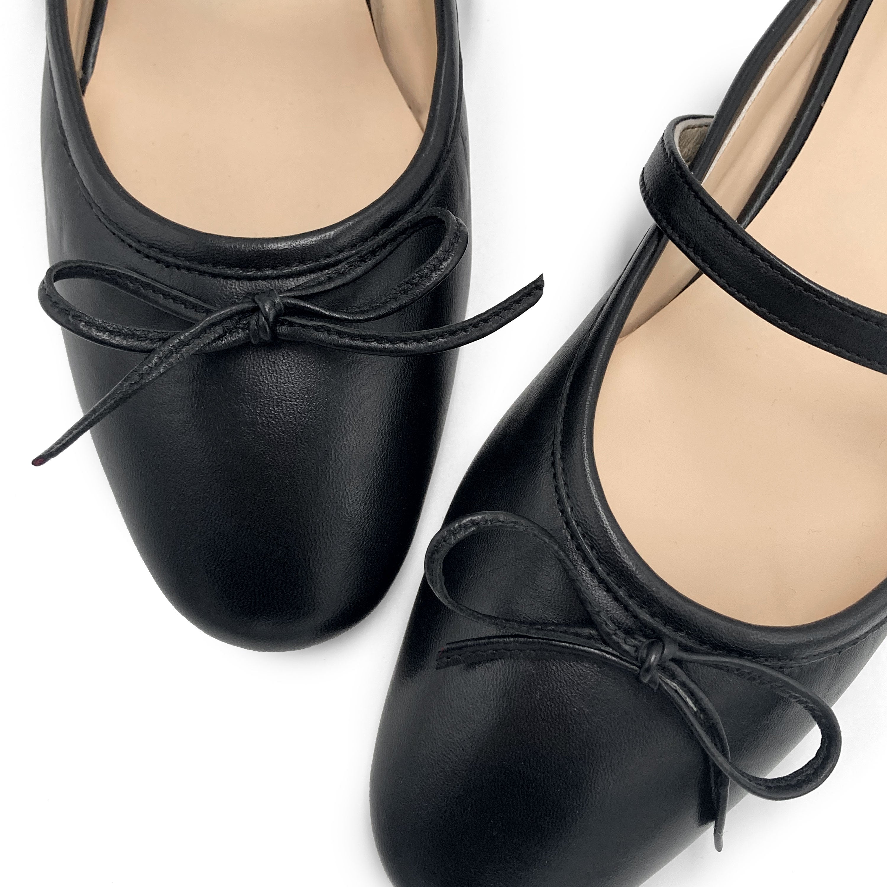 Black leather mule ballet flats with handcrafted sacchetto construction