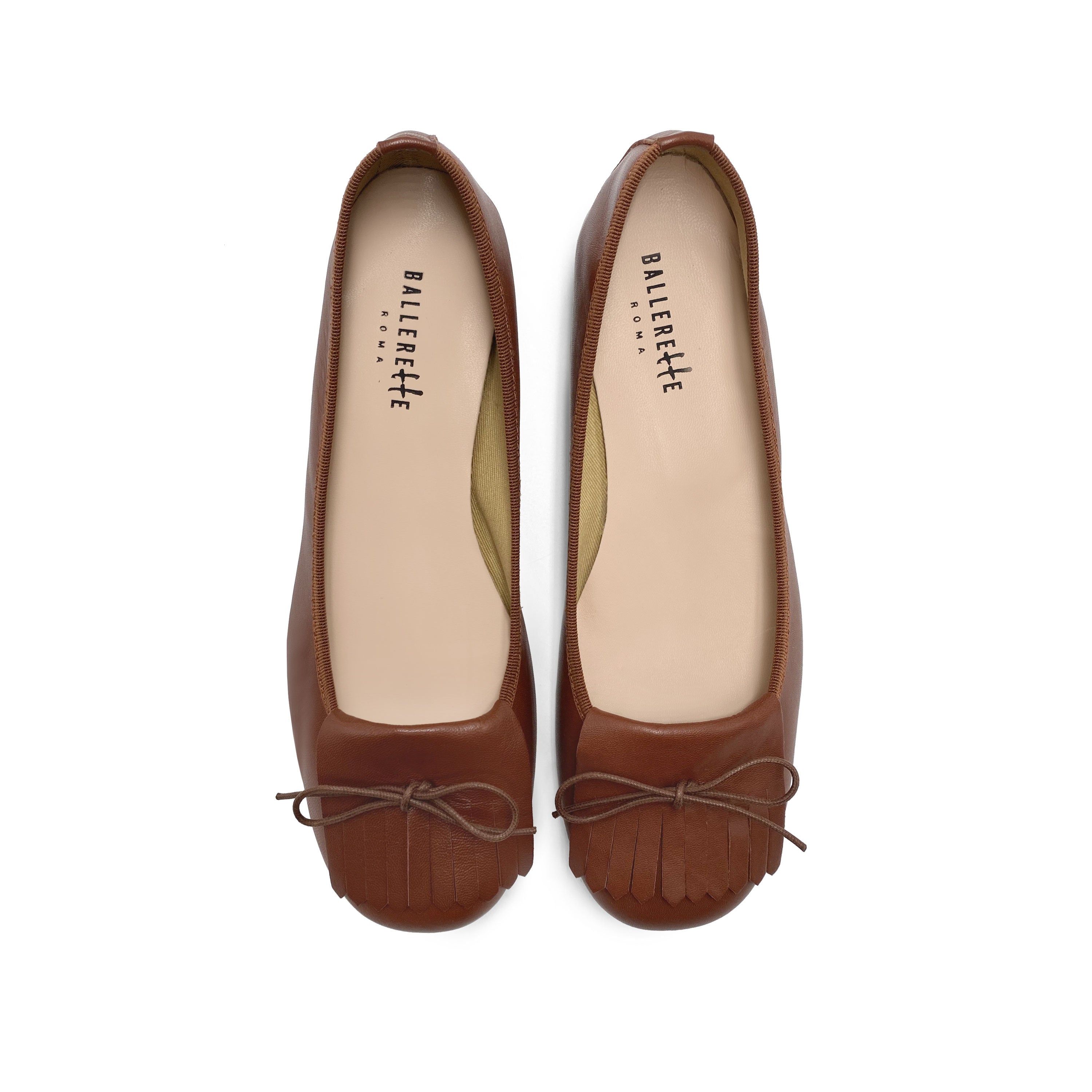 Mocassini marroni in pelle con tacco e frangia