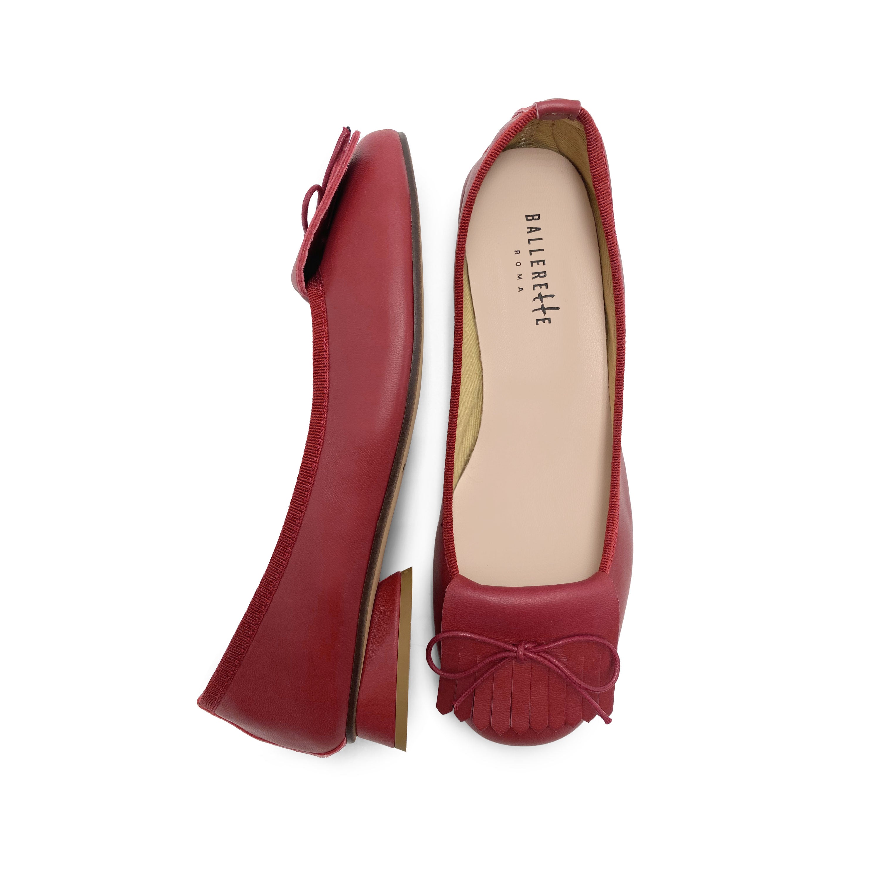 Mocassini ciliegia in pelle con tacco e frangia