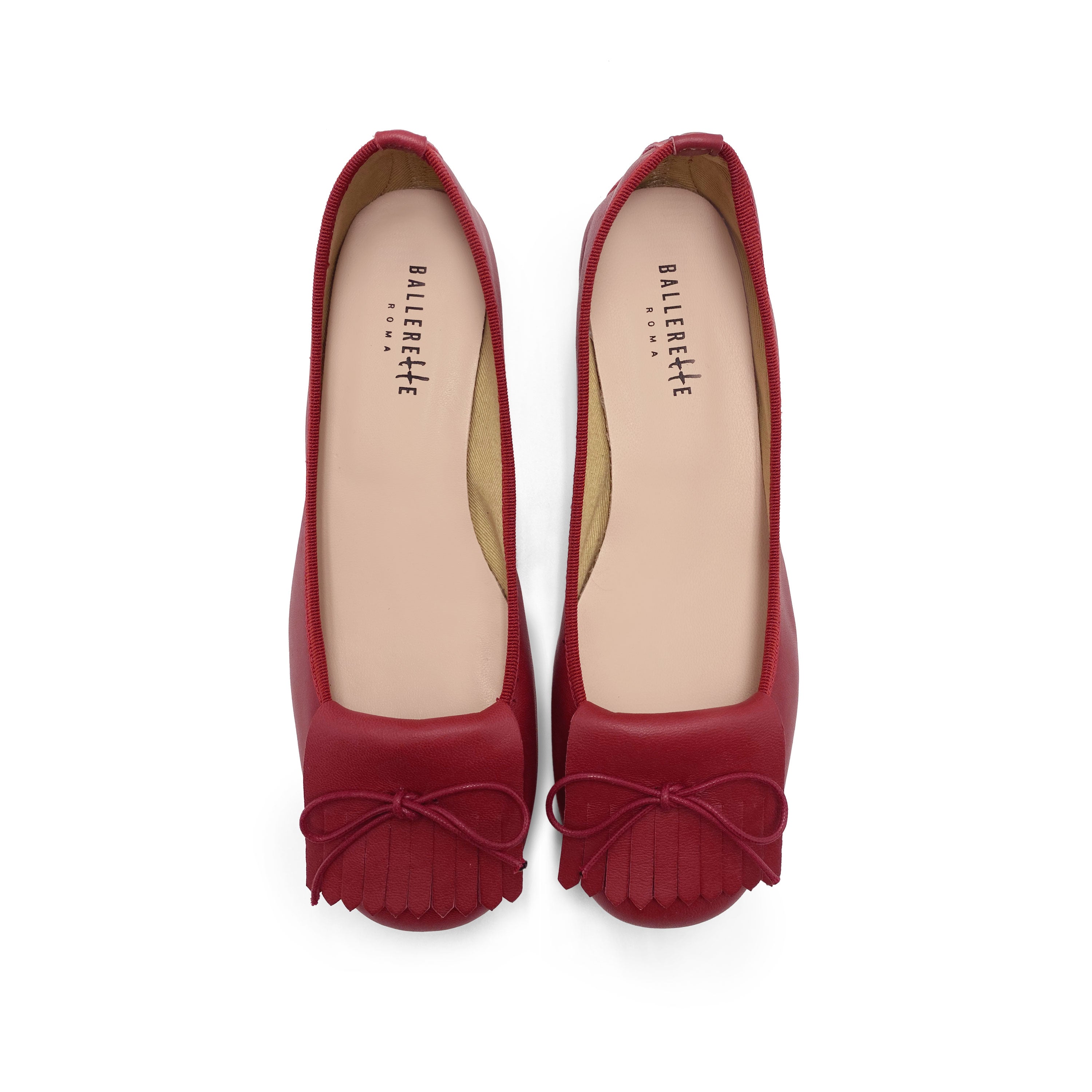 Mocassini ciliegia in pelle con tacco e frangia