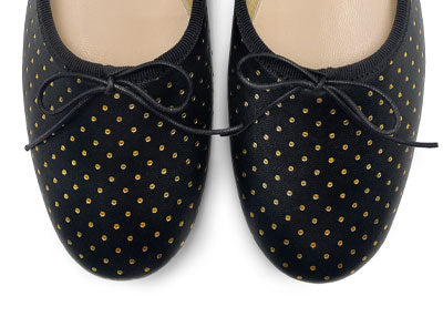 Black leather ballet flats with gold micro polka dots