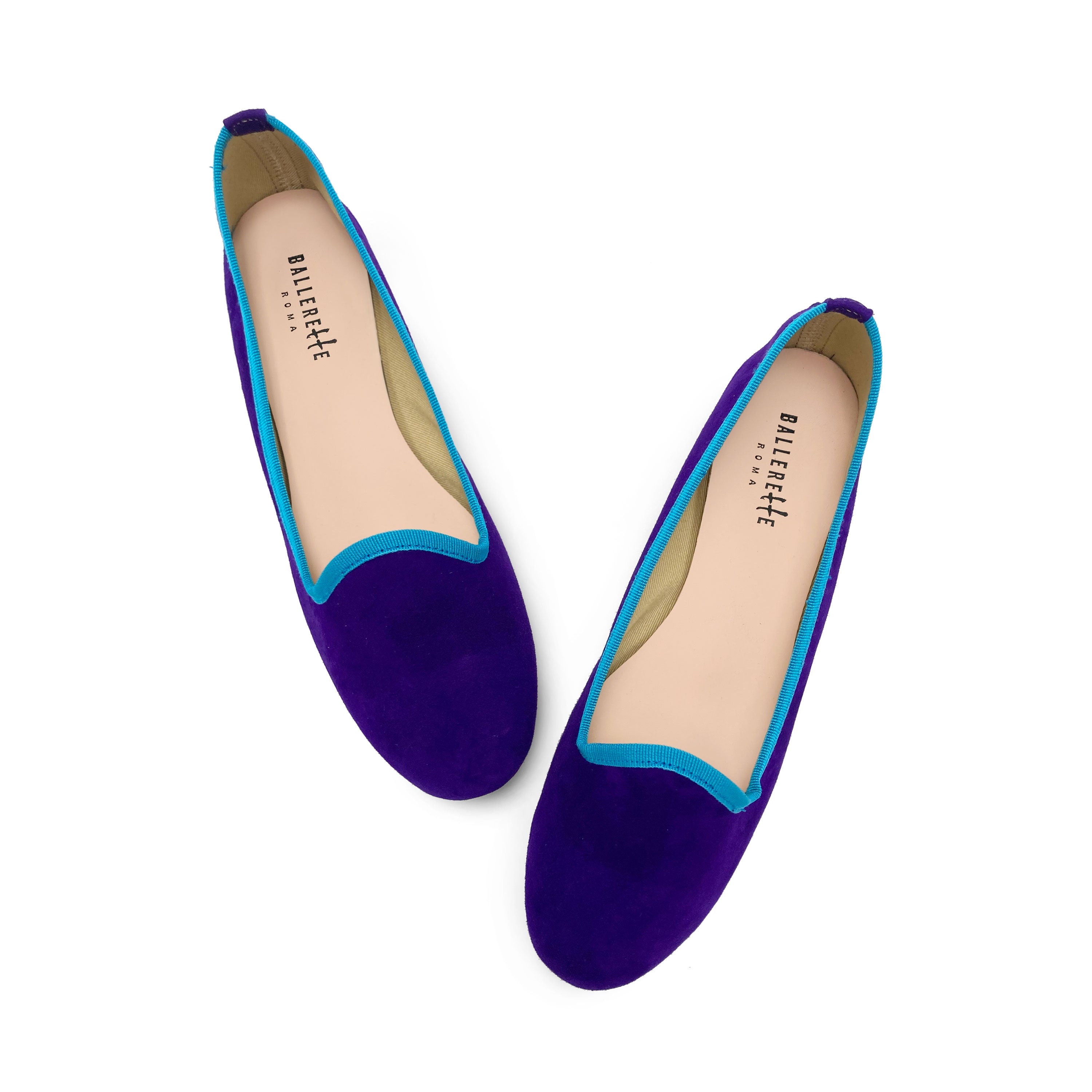 Women's purple suede loafers with turquoise details