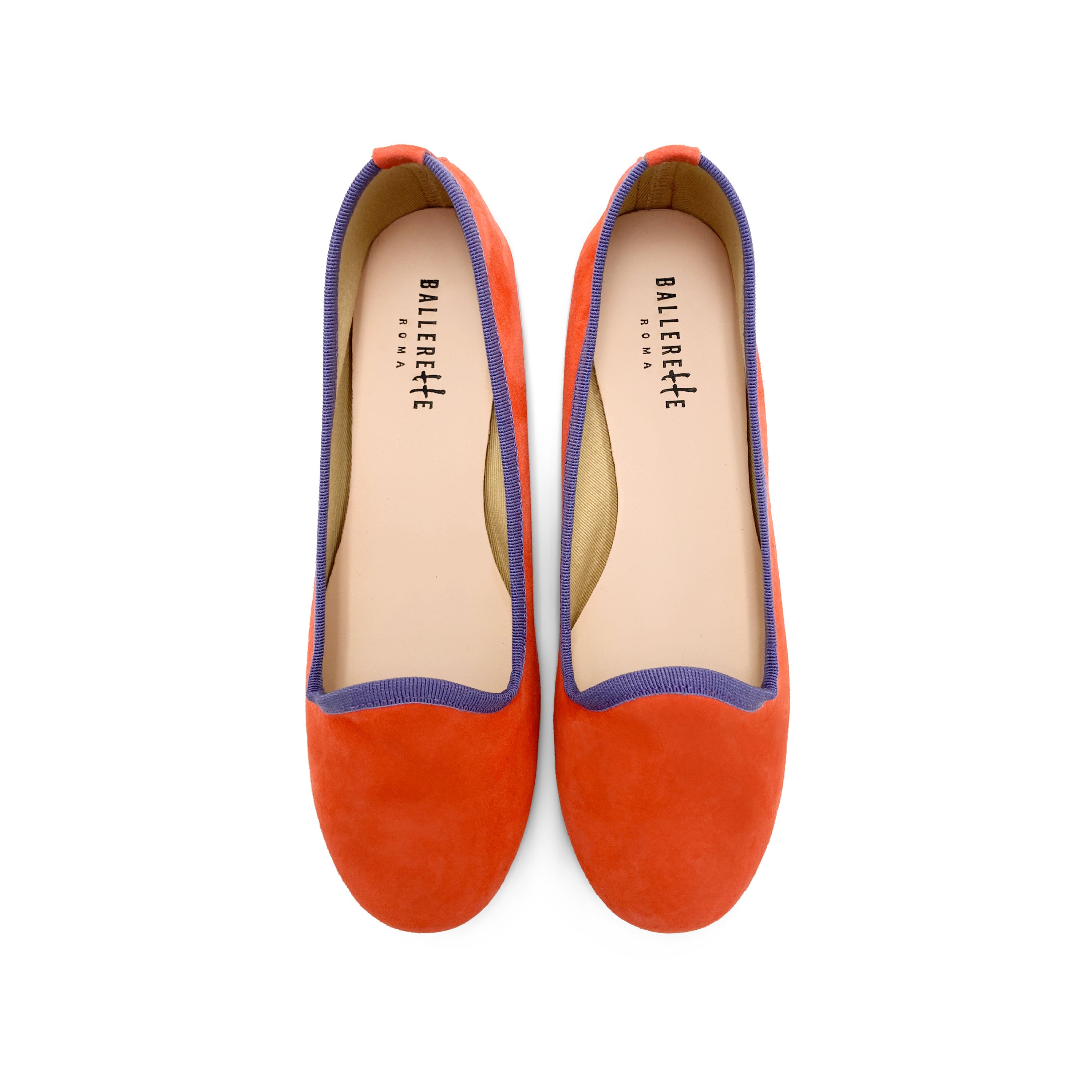 Women's orange suede loafers with purple details