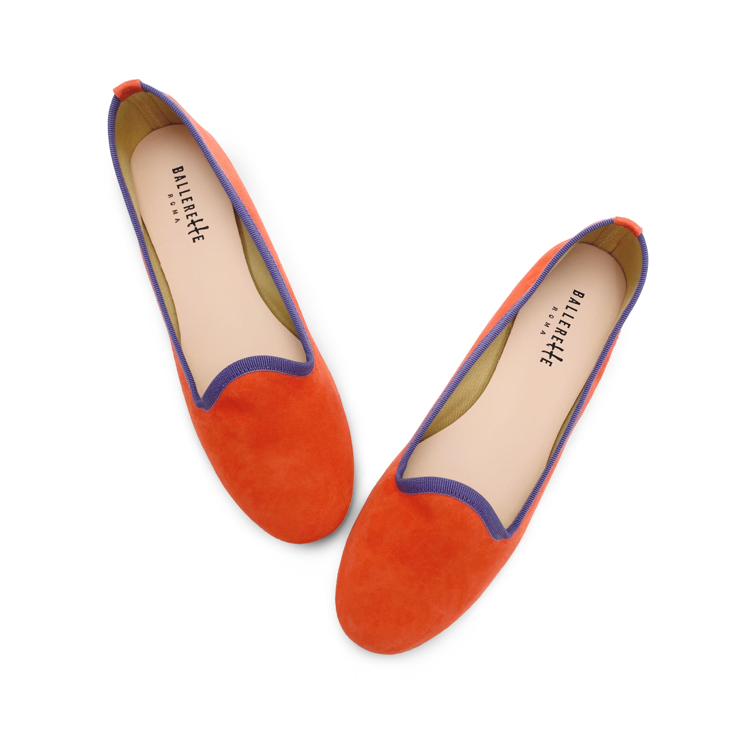Women's orange suede loafers with purple details