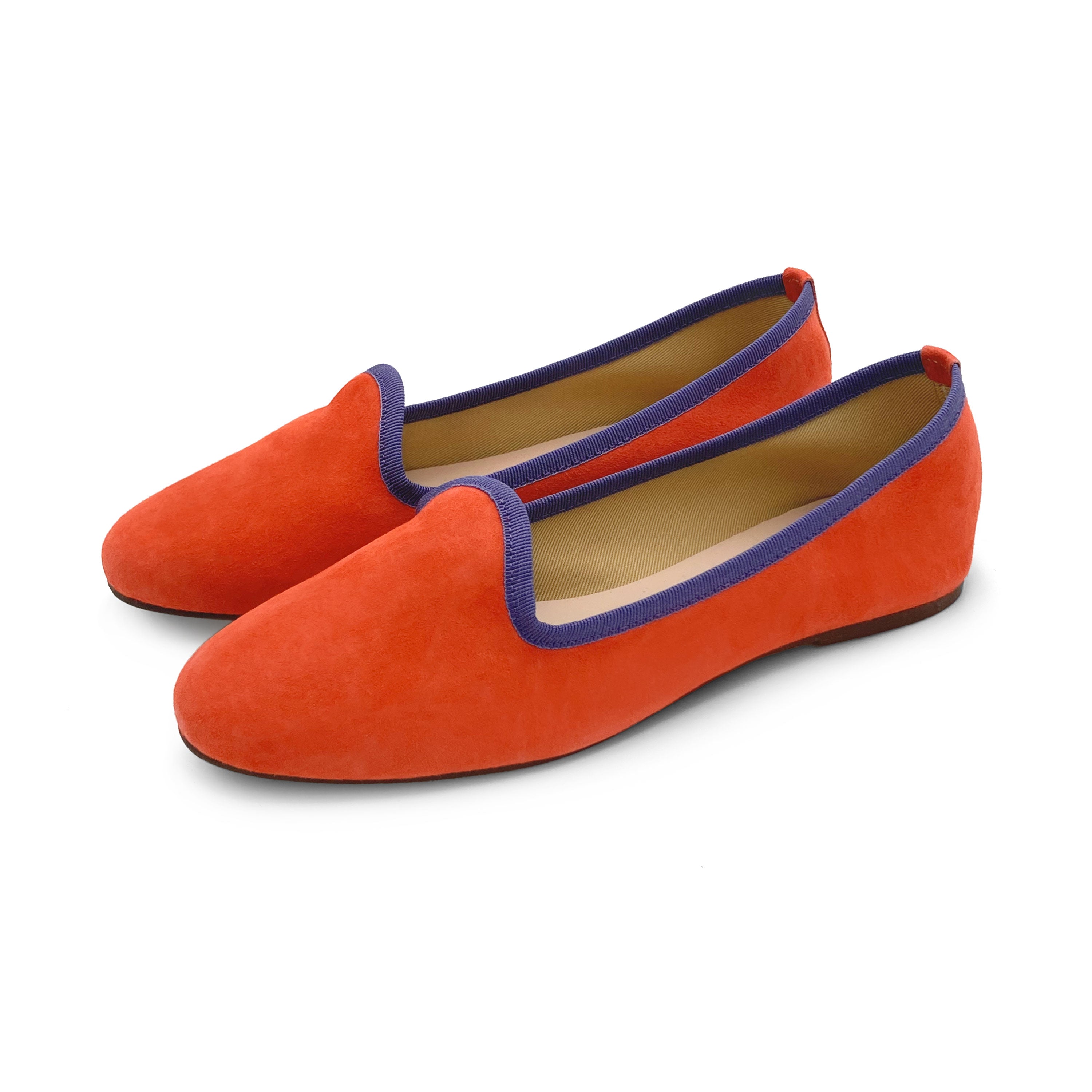 Women's orange suede loafers with purple details