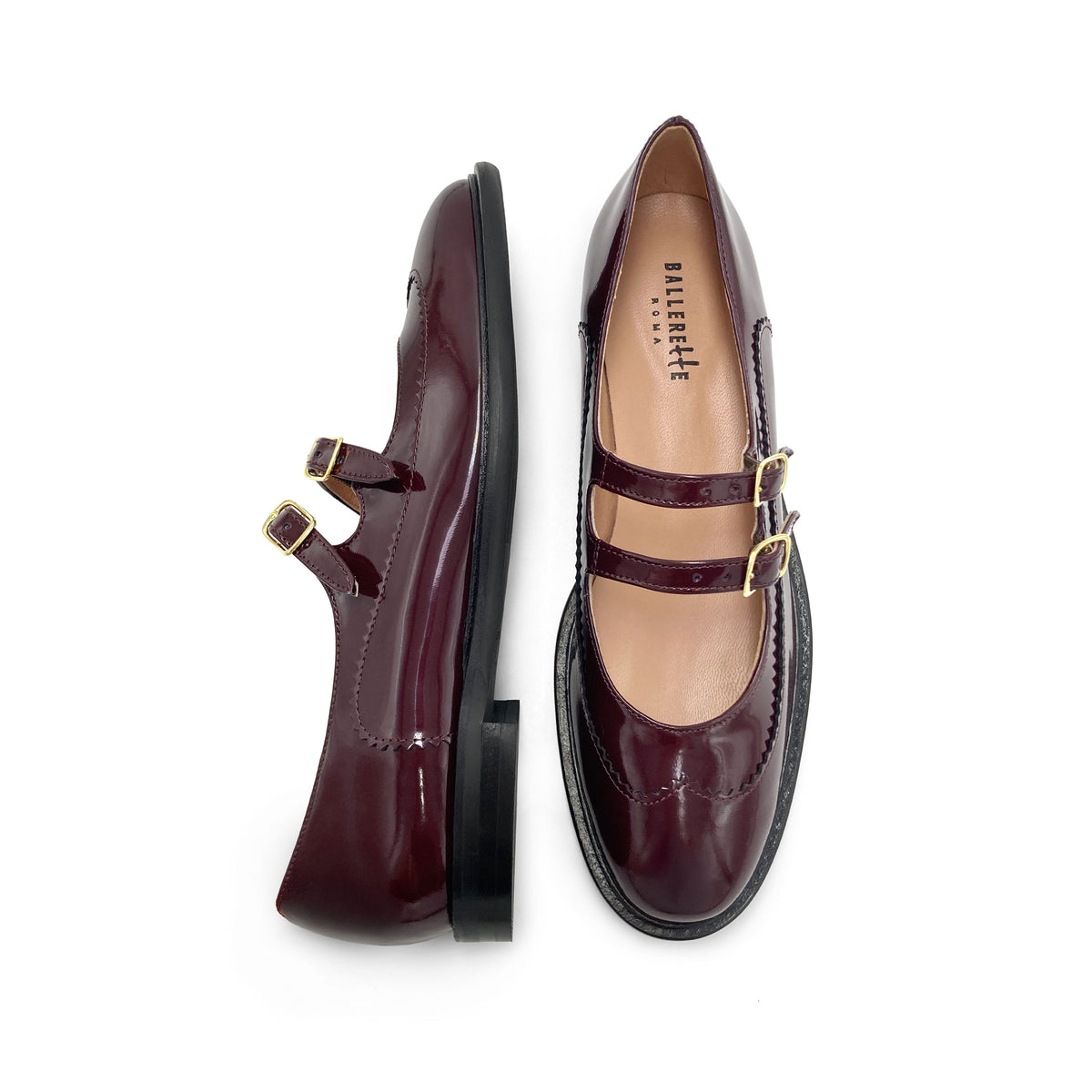 Wingtip-Brogue-Ballerinas aus bordeauxrotem Leder mit doppeltem Riemen