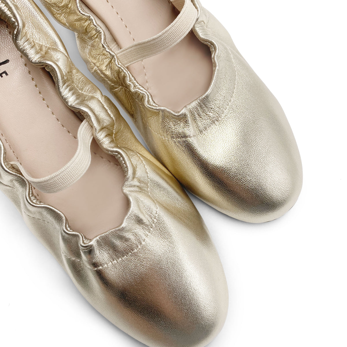 Gold leather glove ballet flats with elastic strap