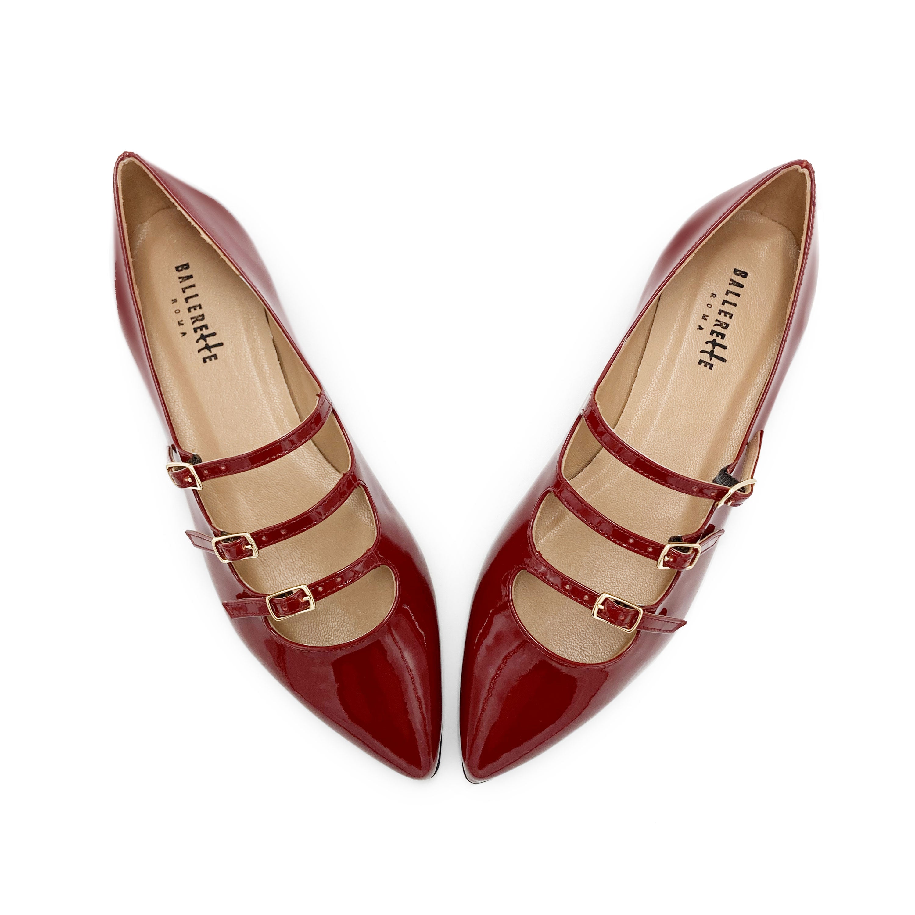 Red shiny pointed ballet flats with three straps