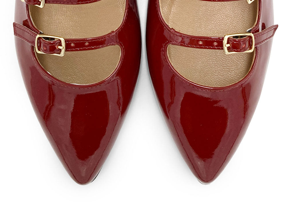 Red shiny pointed ballet flats with three straps