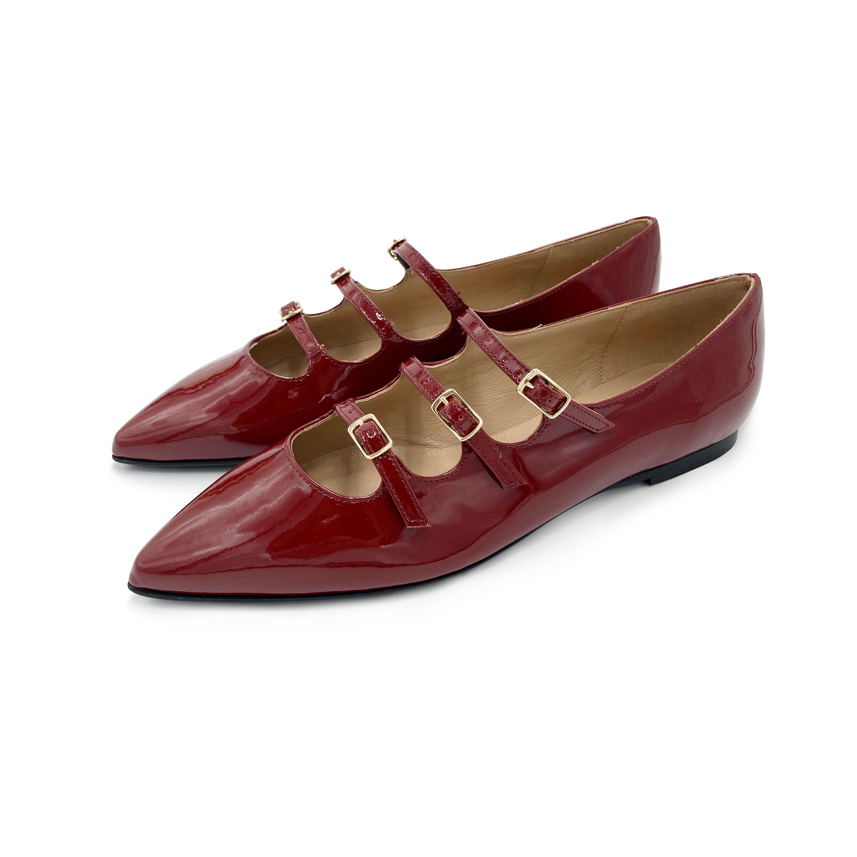 Red shiny pointed ballet flats with three straps