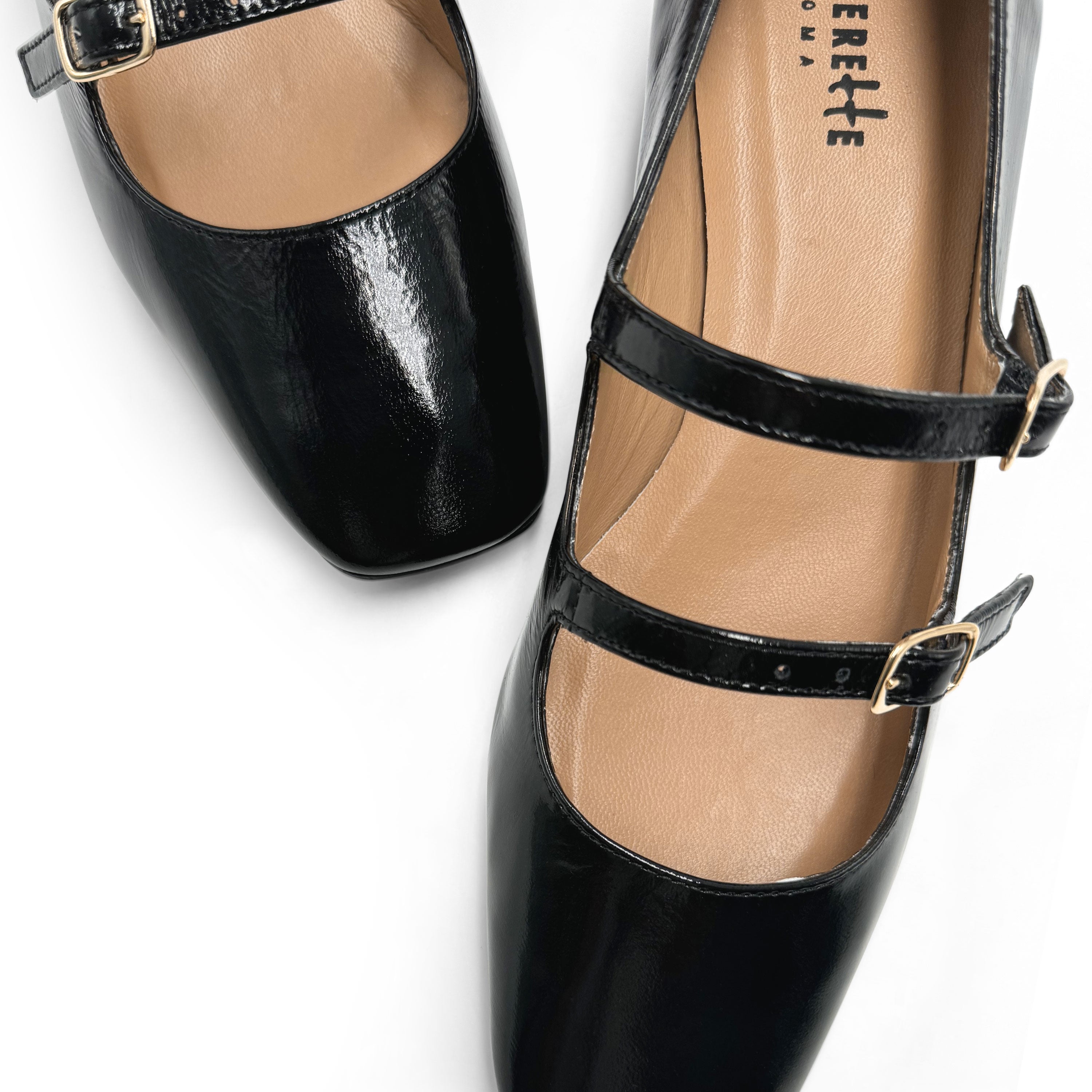 Black shiny leather Mary Jane shoes with two straps and high heels
