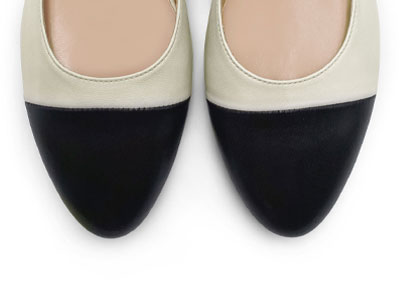 Slingback ballet flats in ivory and black leather