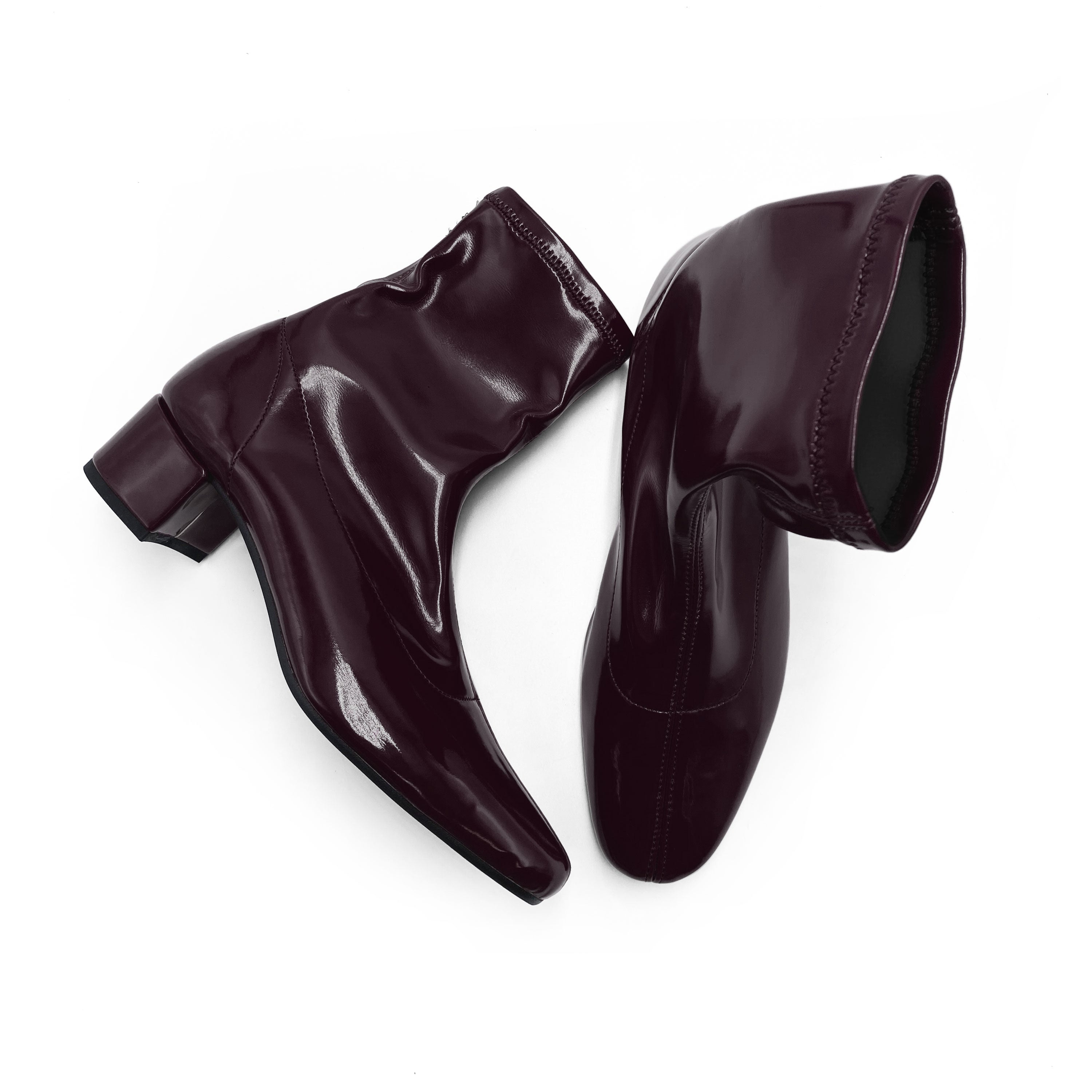 Eggplant patent ankle boots with stretch sock fit