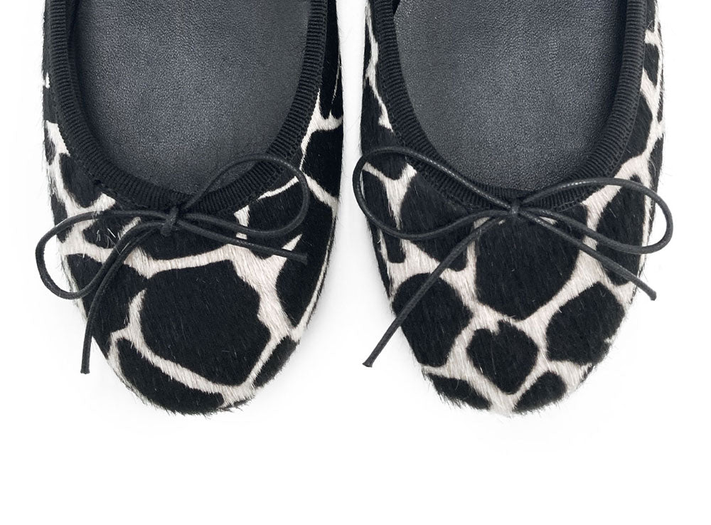 Black and white animal print ballet flats