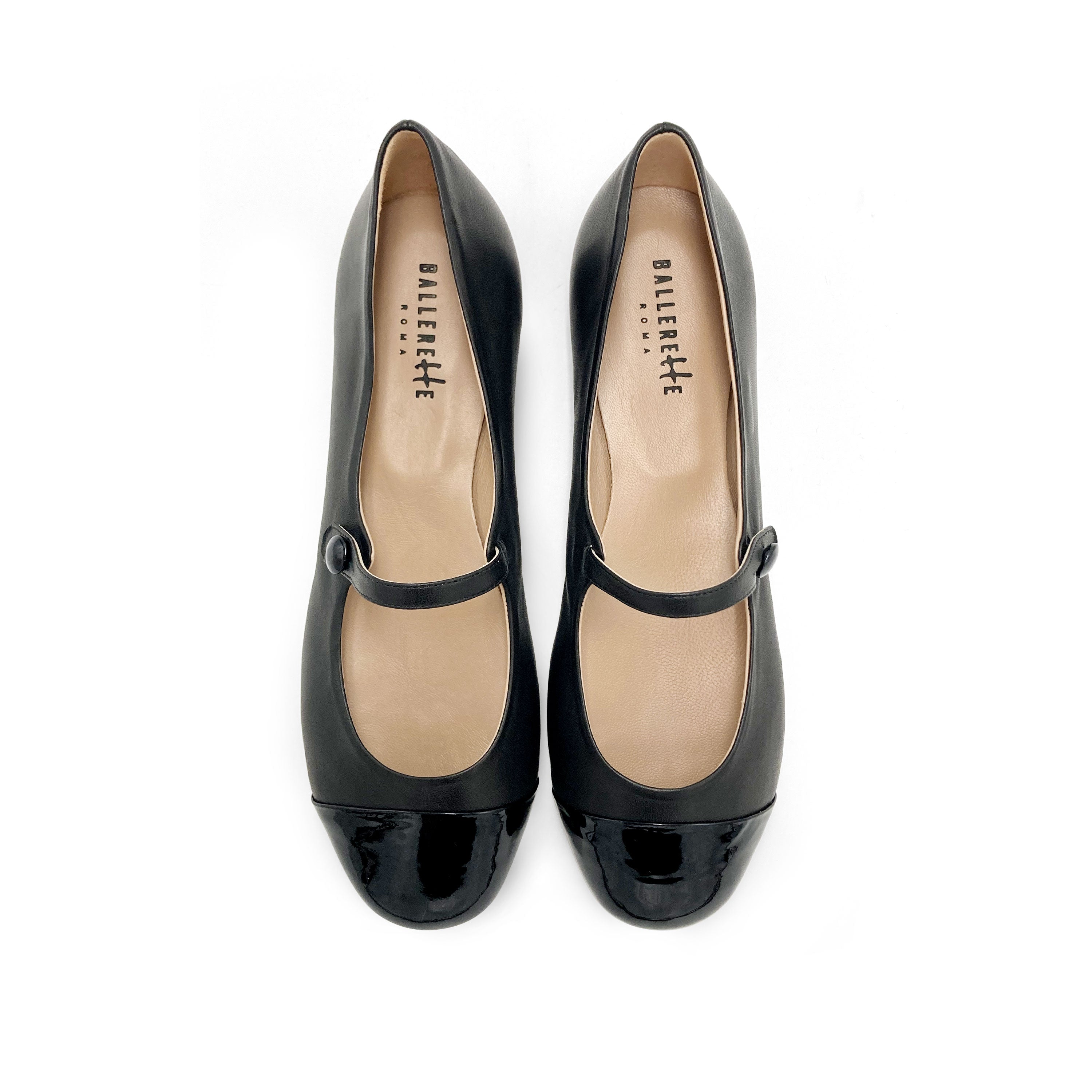 Black leather ballet flats with patent leather strap and toe