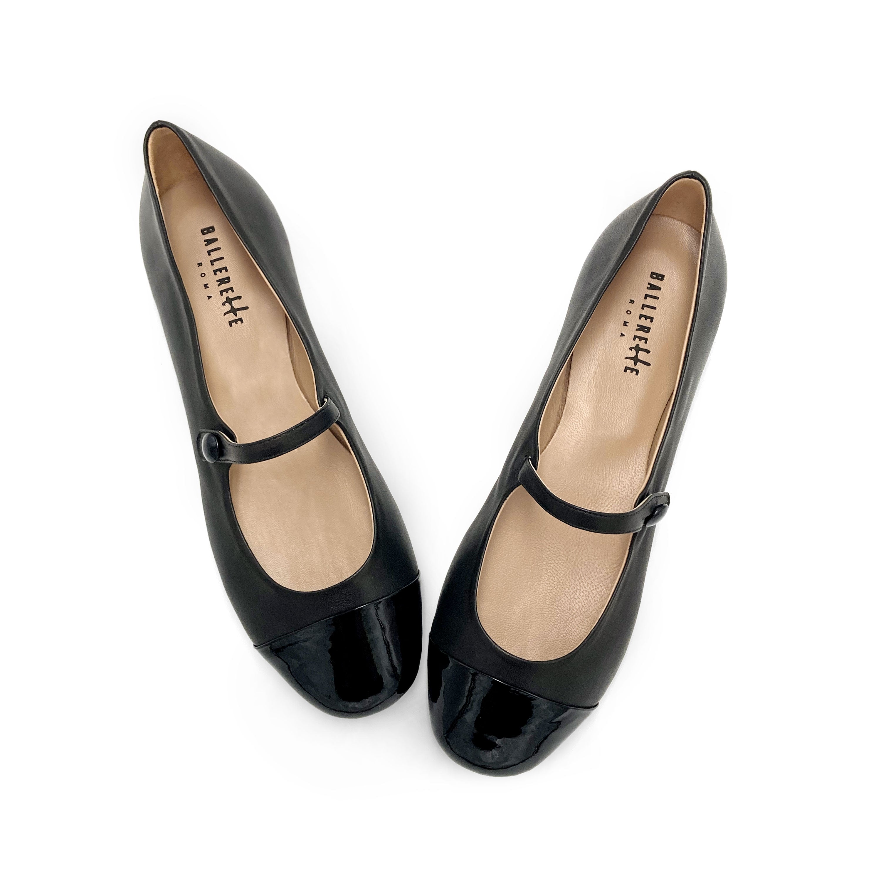 Black leather ballet flats with patent leather strap and toe