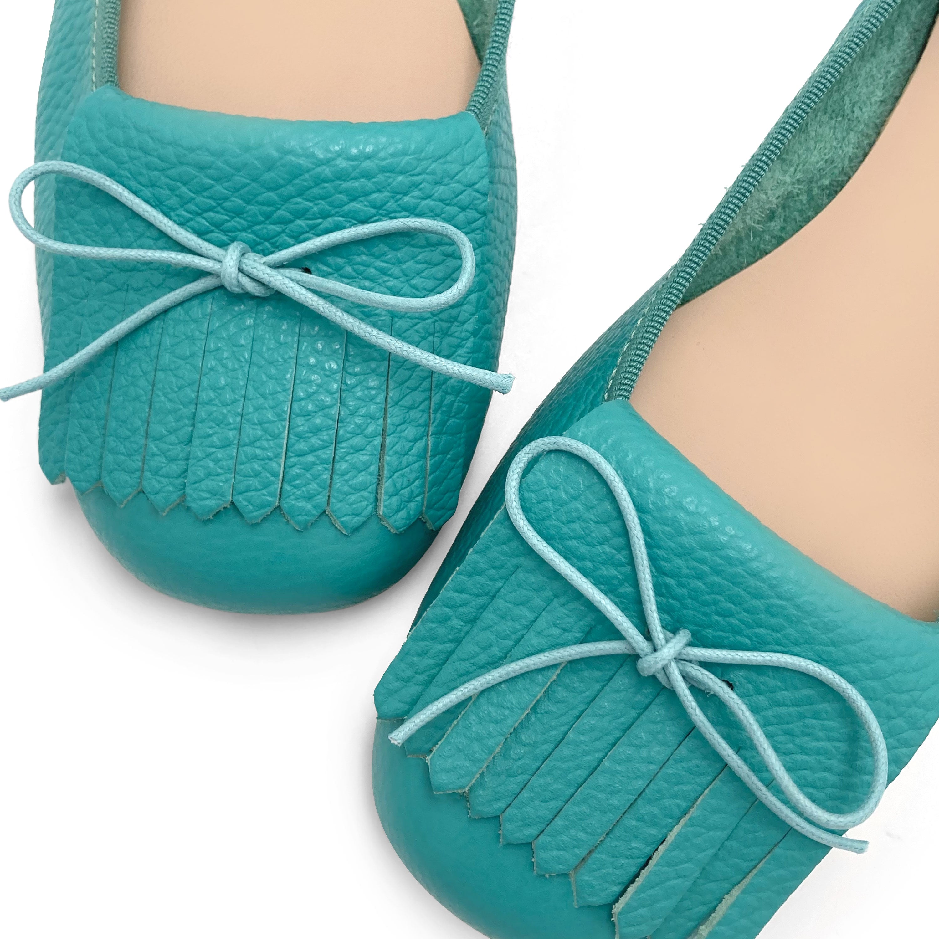 Mocassins femme en cuir bleu aqua à franges