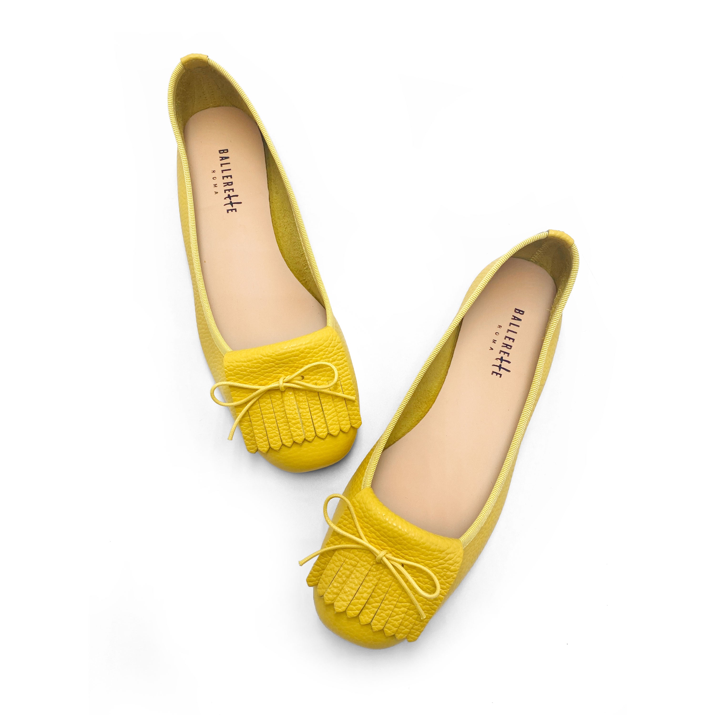 Yellow leather loafers with fringe tassel